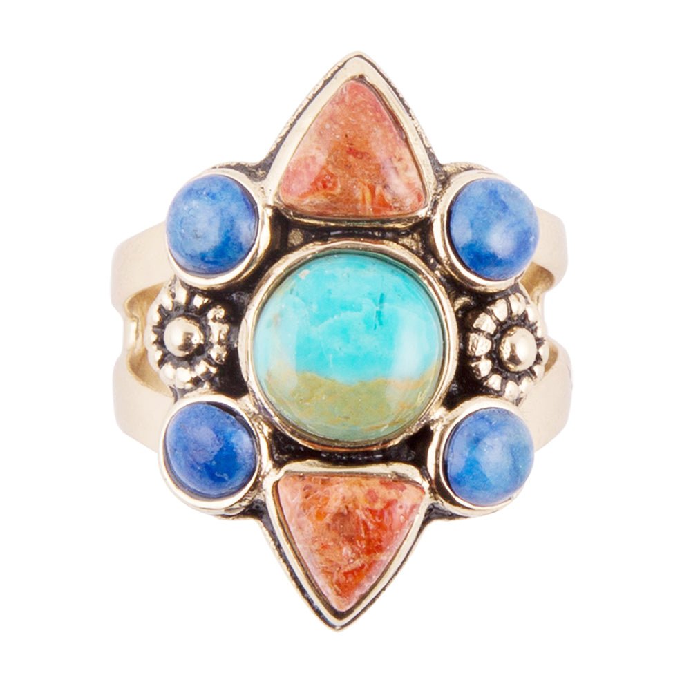Ring with colorful stones on a white background