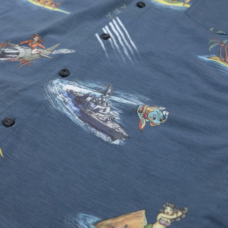 Navy blue shirt with colorful mermaid and ship design on a blue background