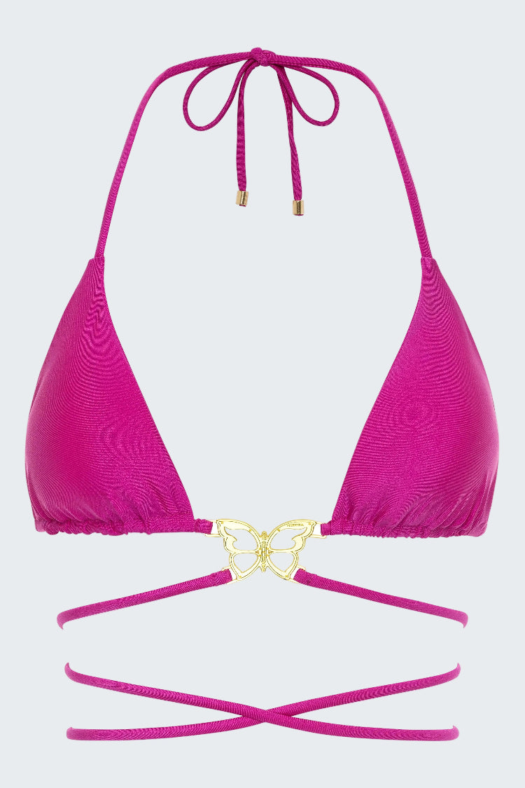 Pink bikini top with gold butterfly detail on a white background