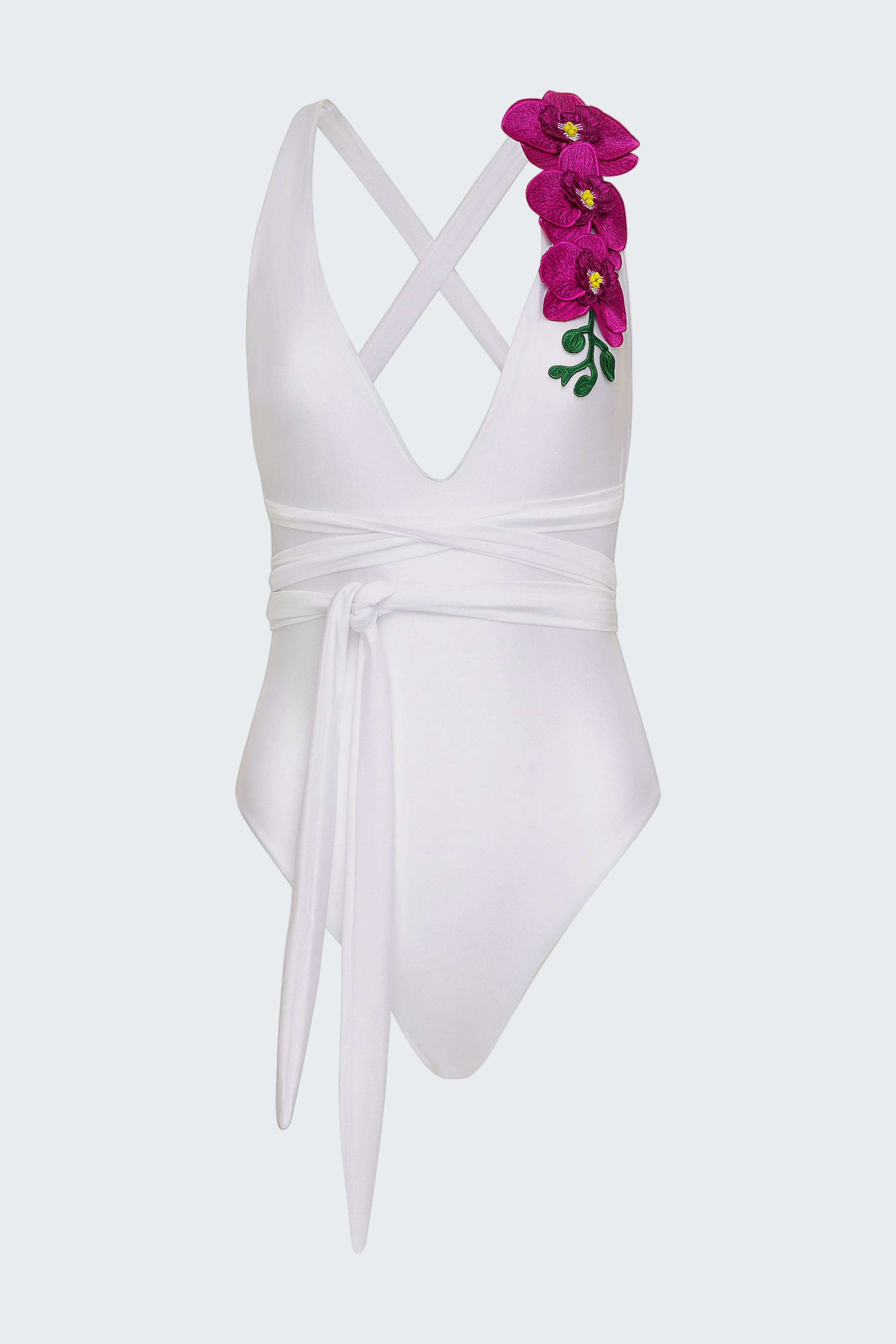 White swimsuit with floral design on a white background