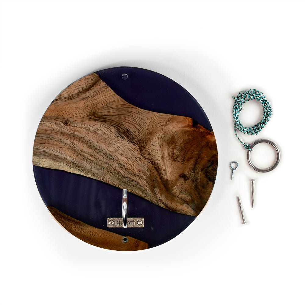 Round wall hook with a live-edge wood and dark navy background design, shown with mounting hardware including a metal ring, screws, and a teal cord on a white background.