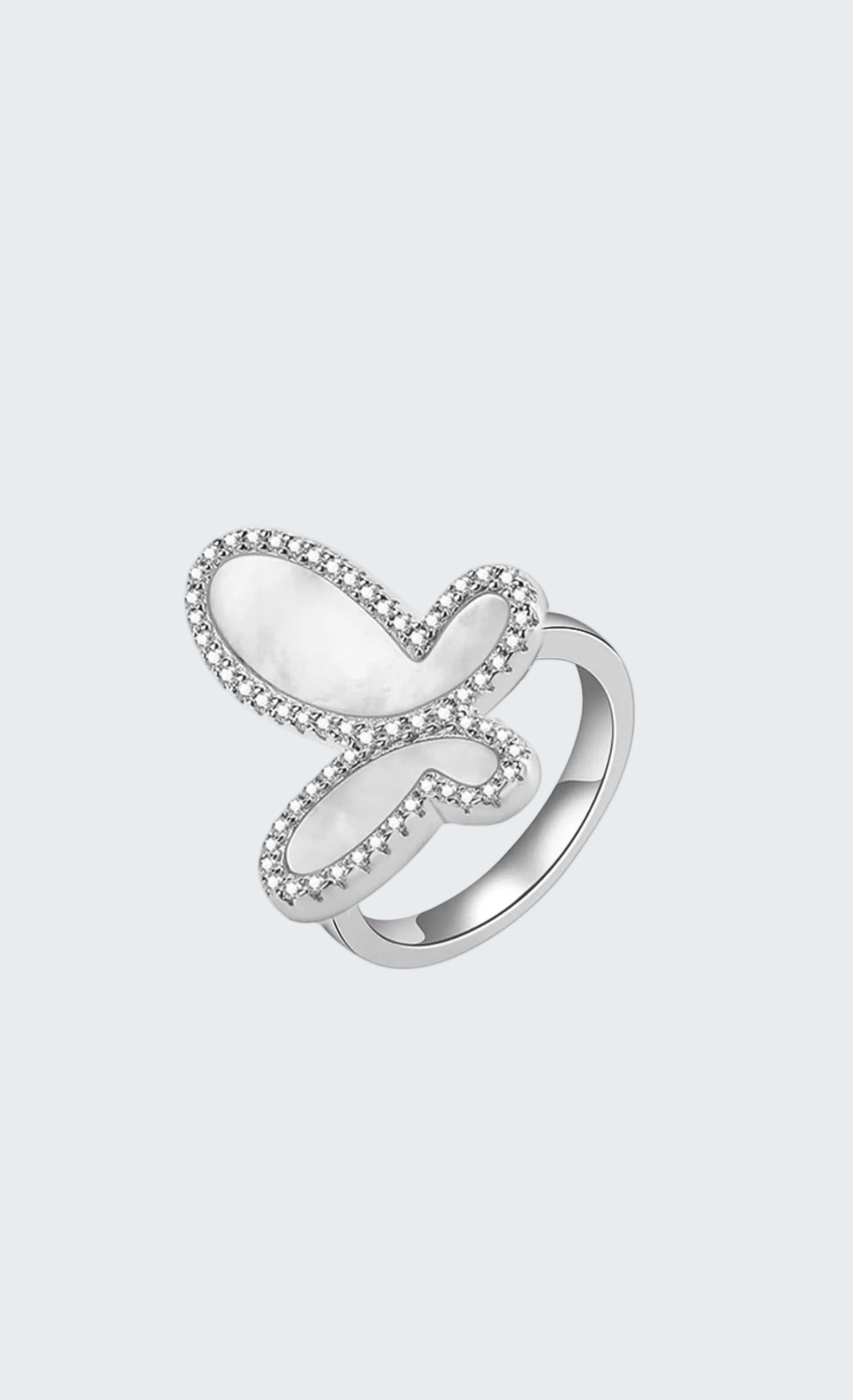 Silver ring with a heart-shaped design on a white background