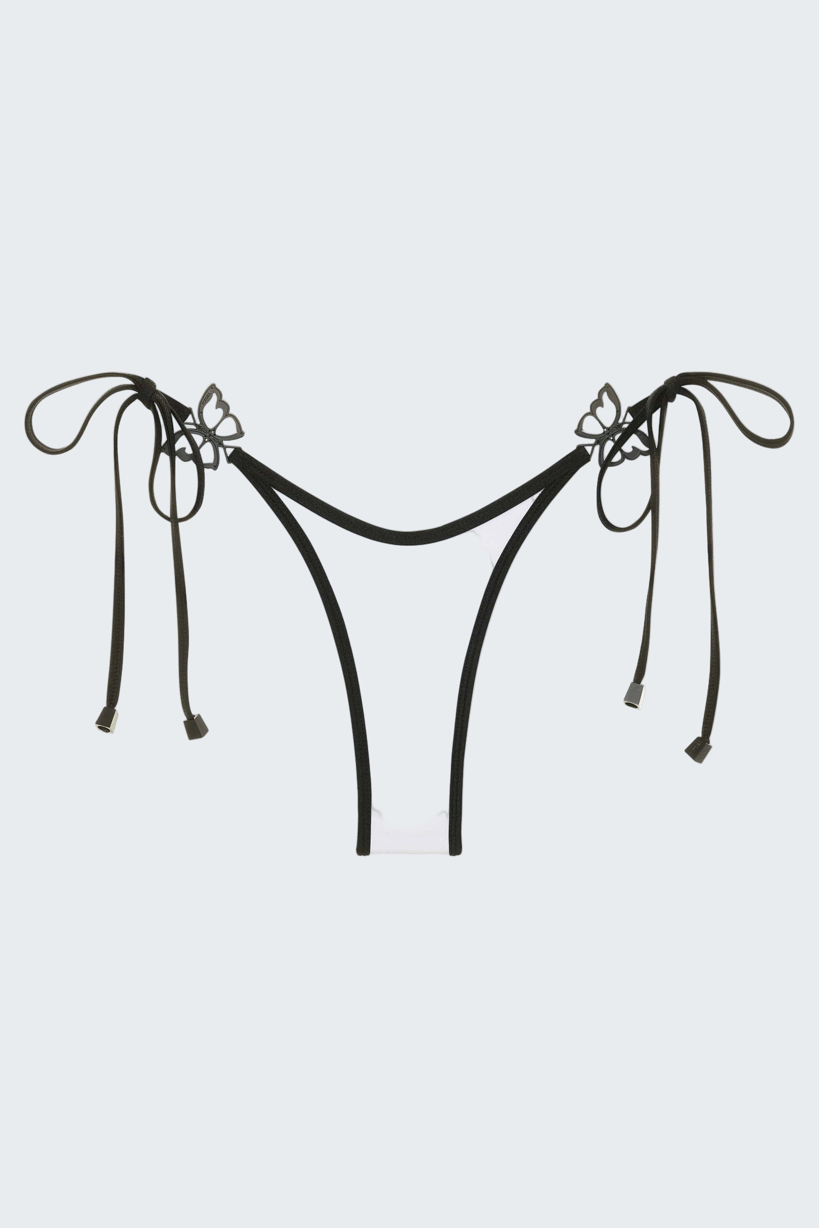 White bikini bottom with black straps and bows on a white background