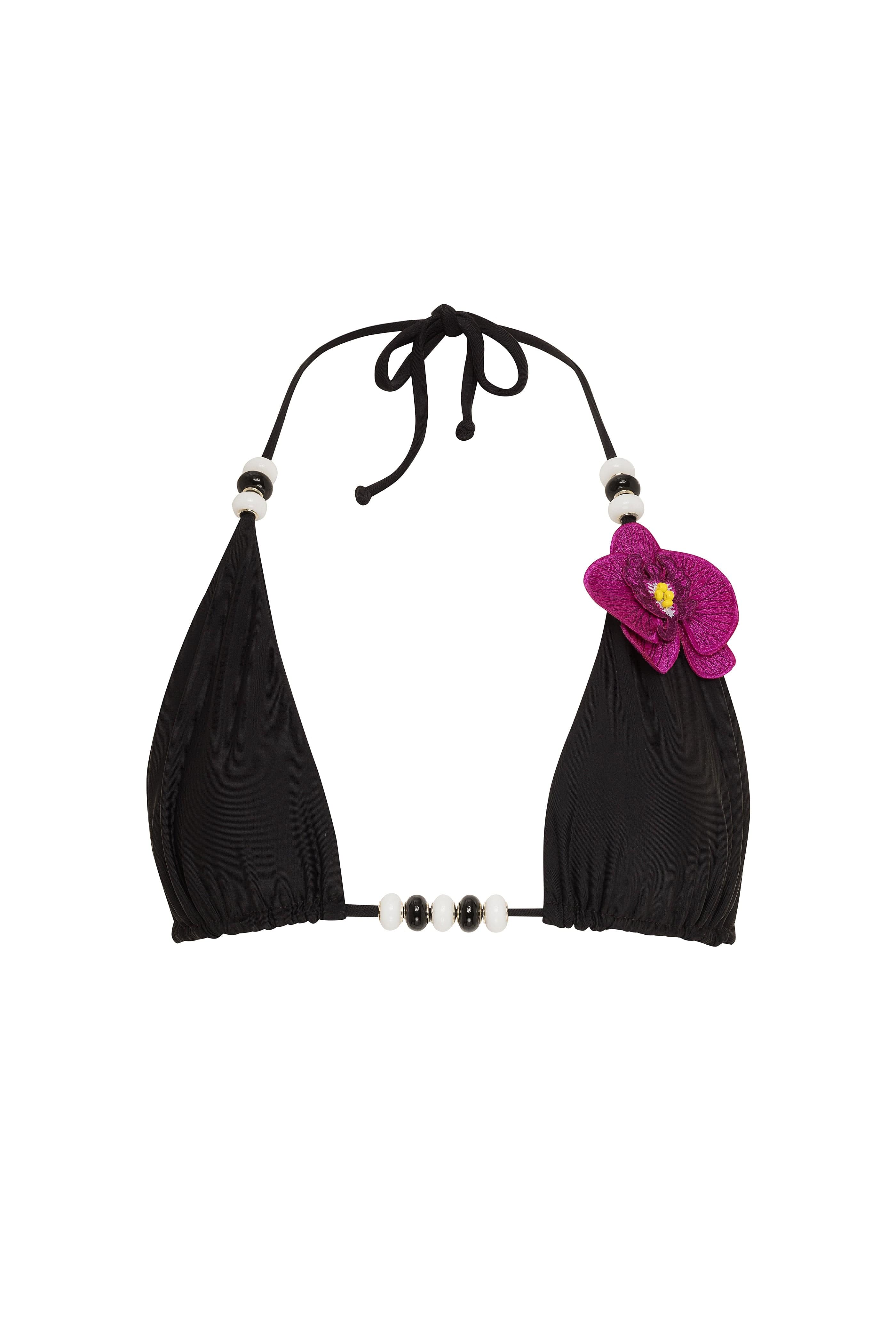 Black bikini top with floral detail and pearl accents on a white background