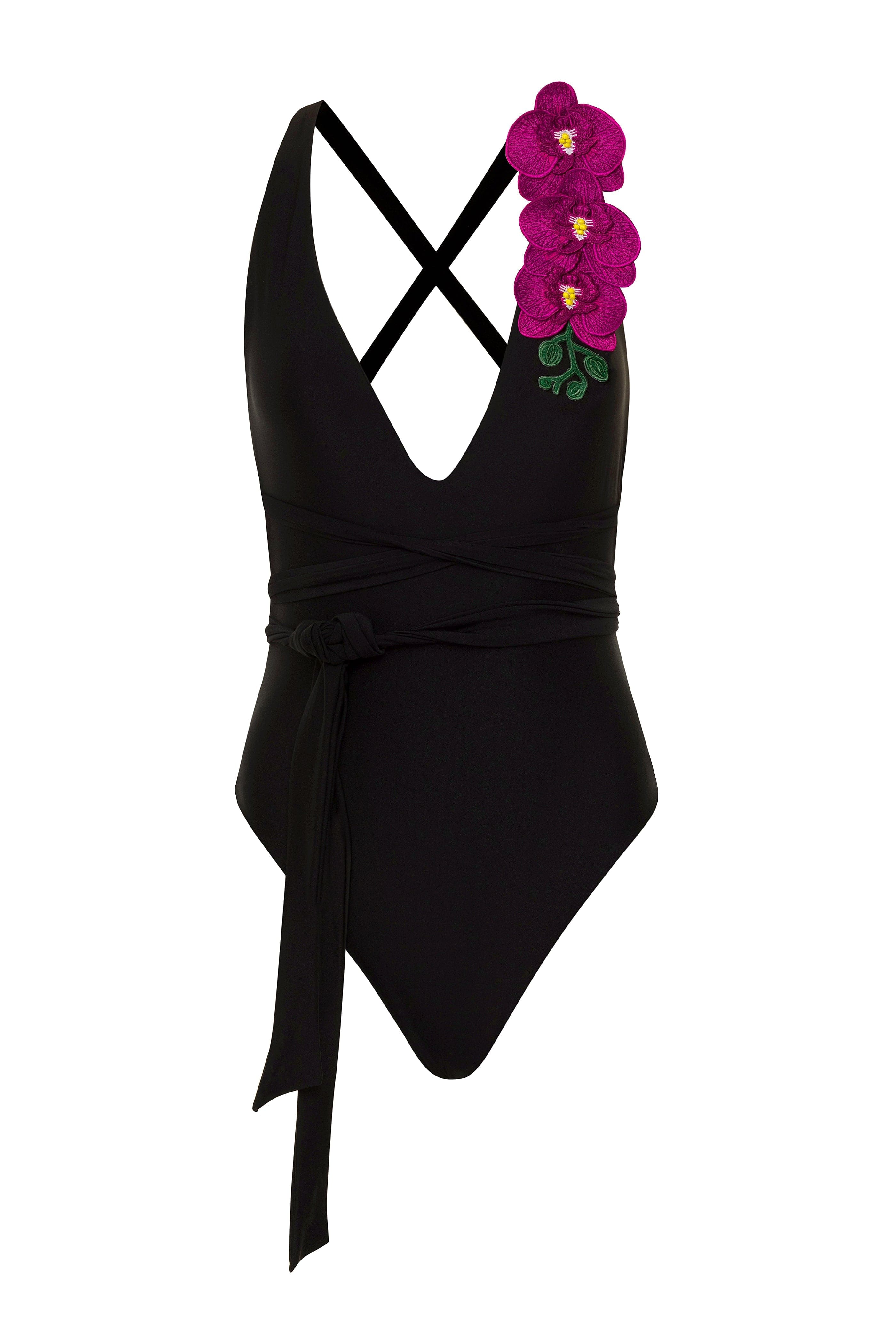 Black swimsuit with floral design on a white background