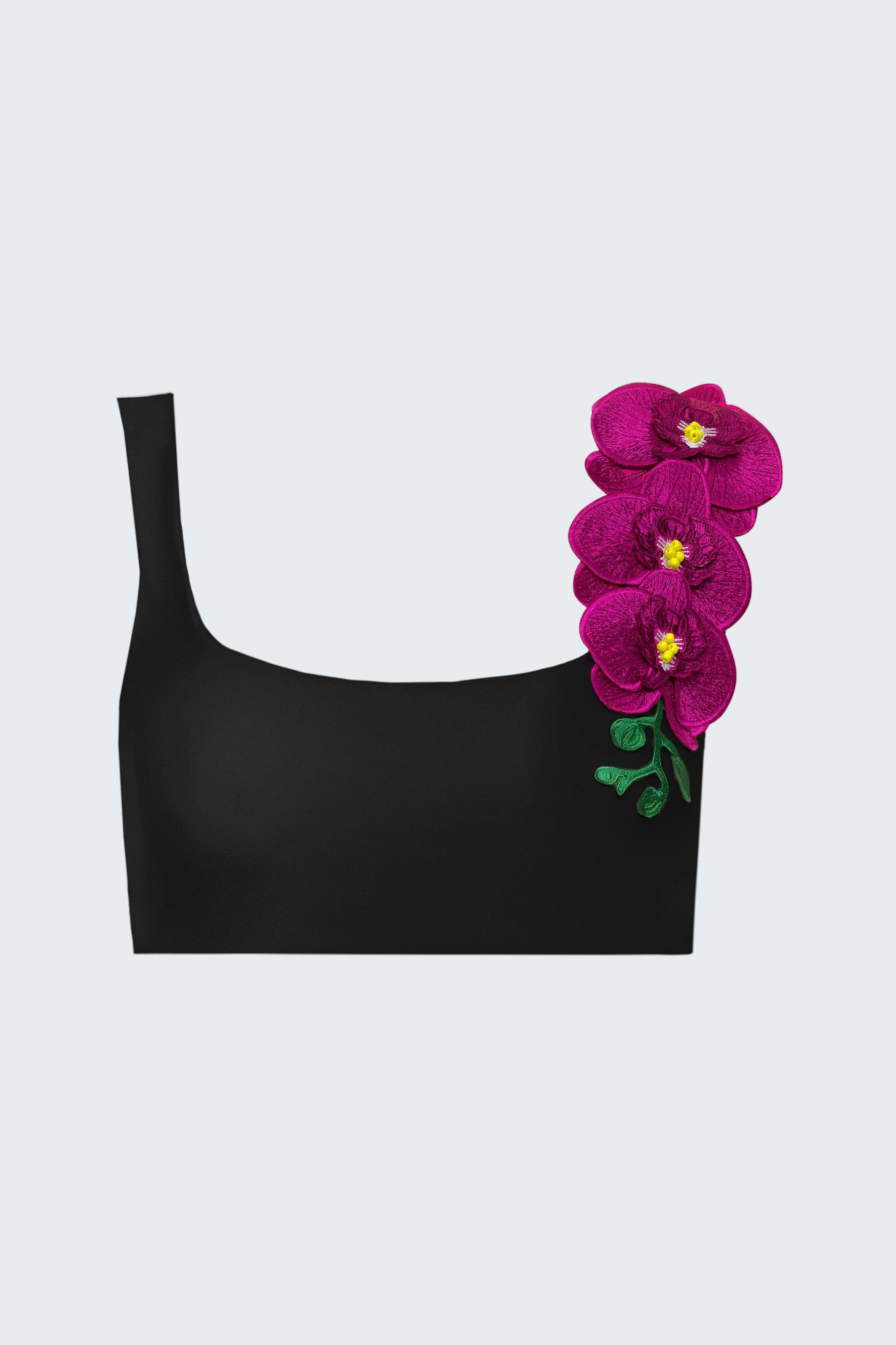 Black top with pink floral embellishments on a white background