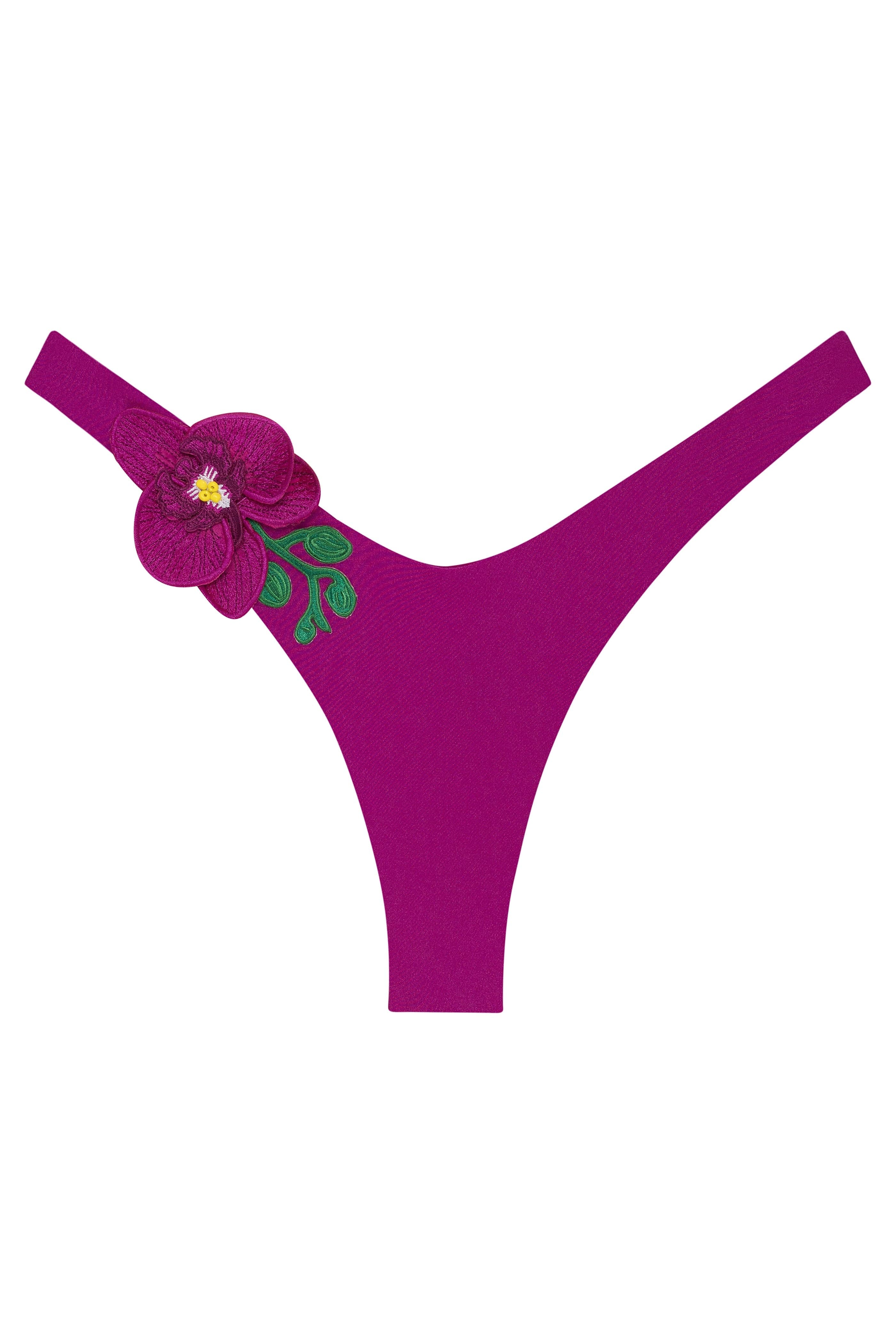 Purple thong with floral design on a white background