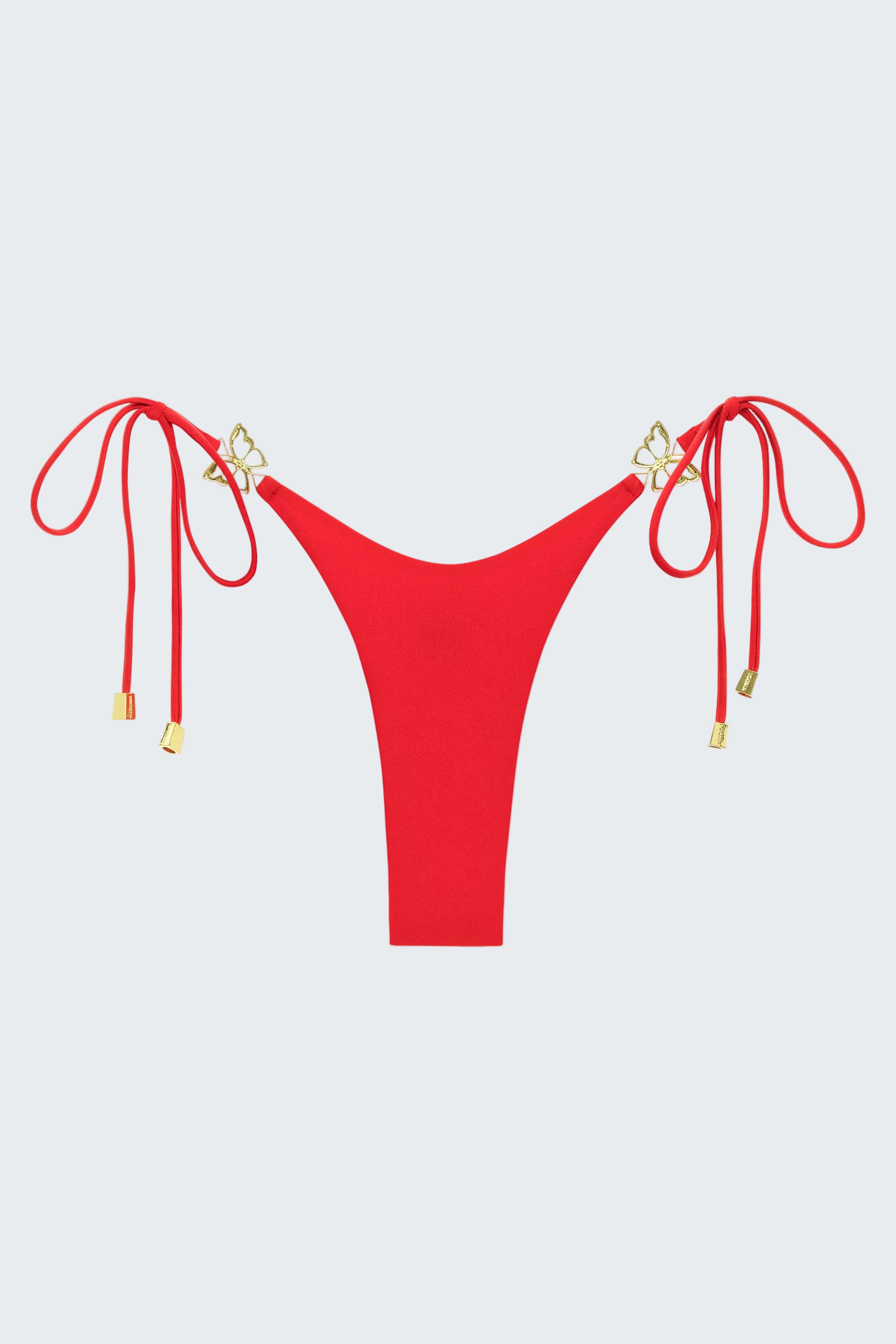 Red bikini bottom with tie sides on a white background