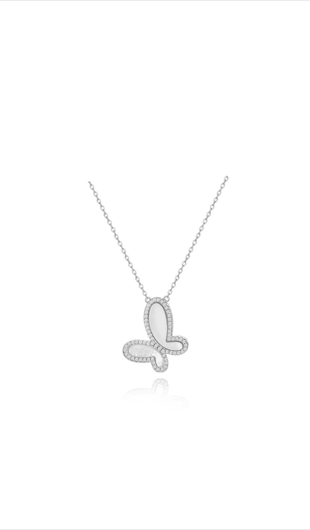 Butterfly-shaped silver necklace on a white background