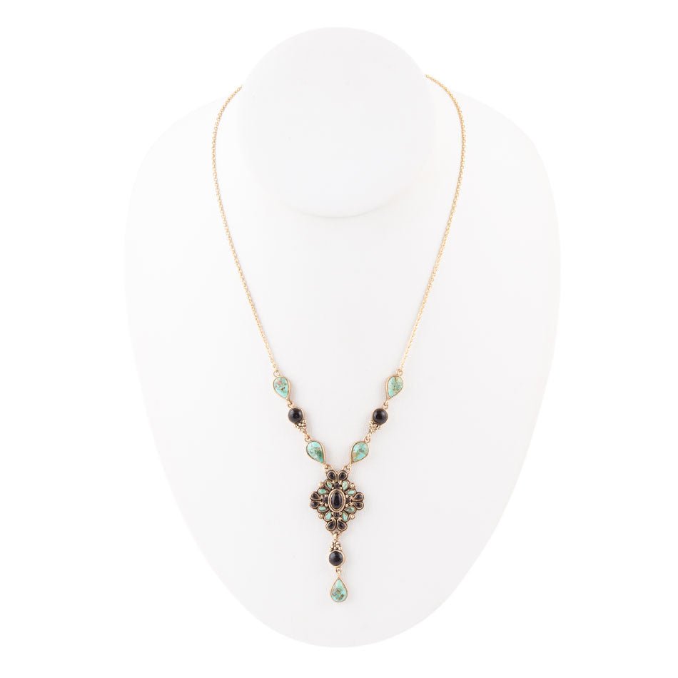 Necklace with gemstones on a white background
