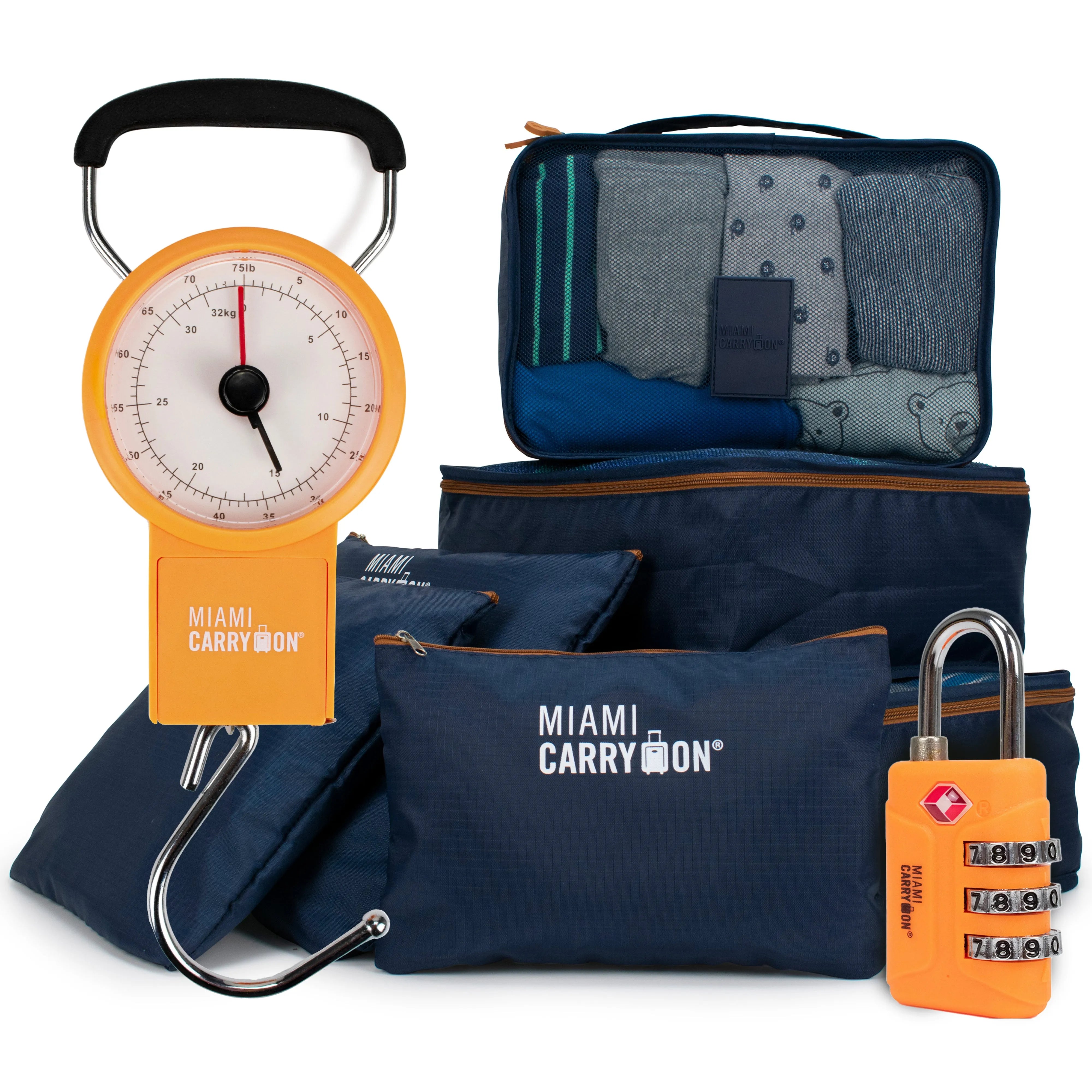 Collection of travel-related items including a luggage scale, packing cubes, and a lock on a white background.