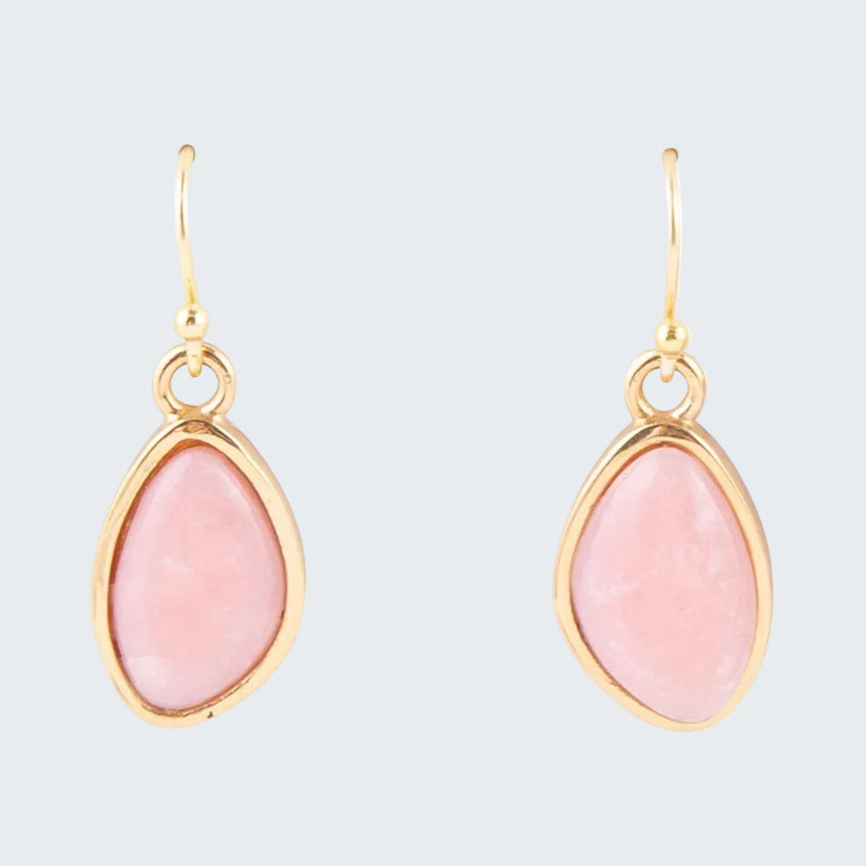 Gold earrings with pink teardrop-shaped stones on a white background