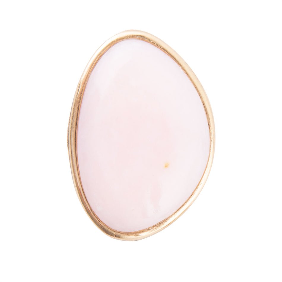 Pink stone with gold frame on a white background