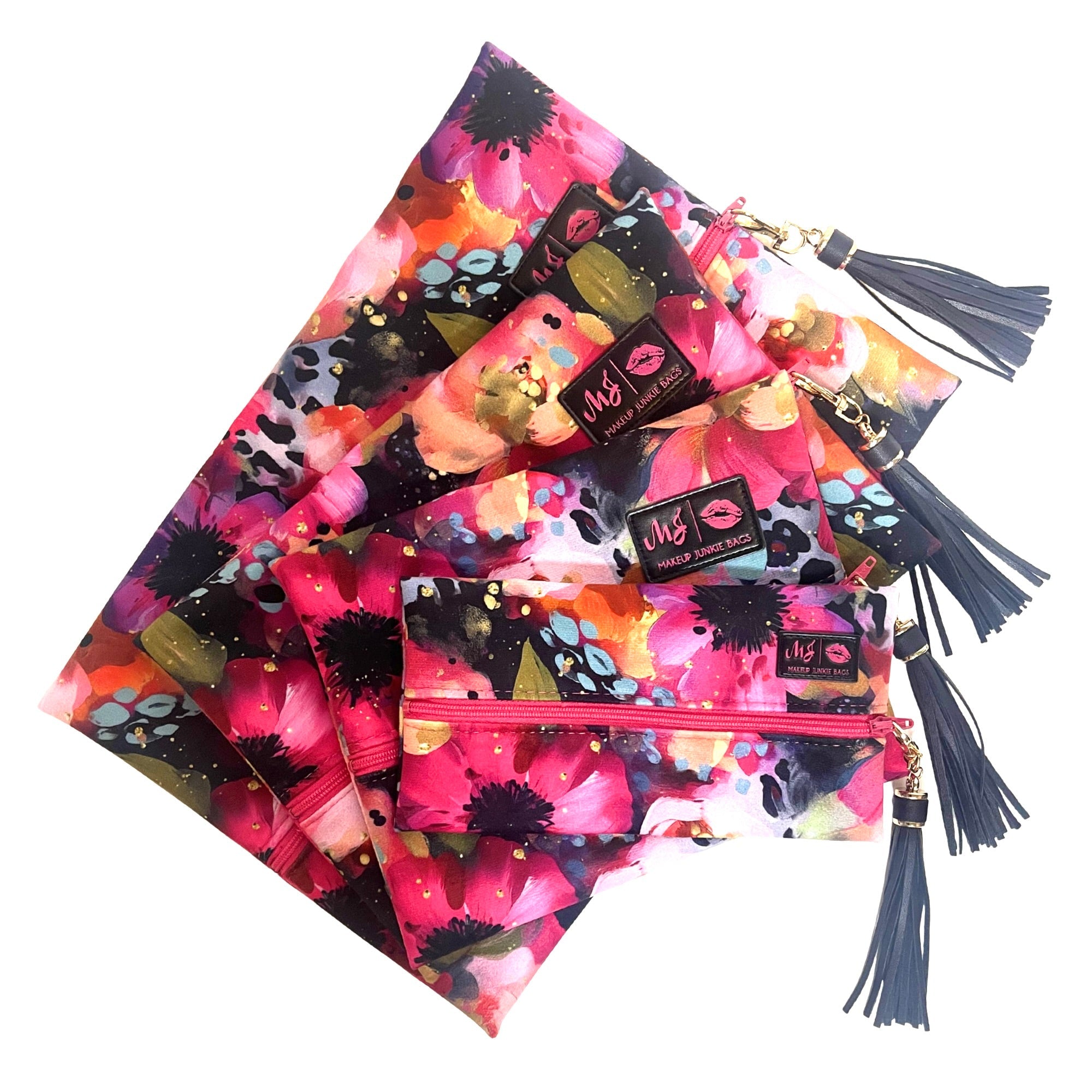Colorful makeup bags with tassels and visible brand logo on a white background