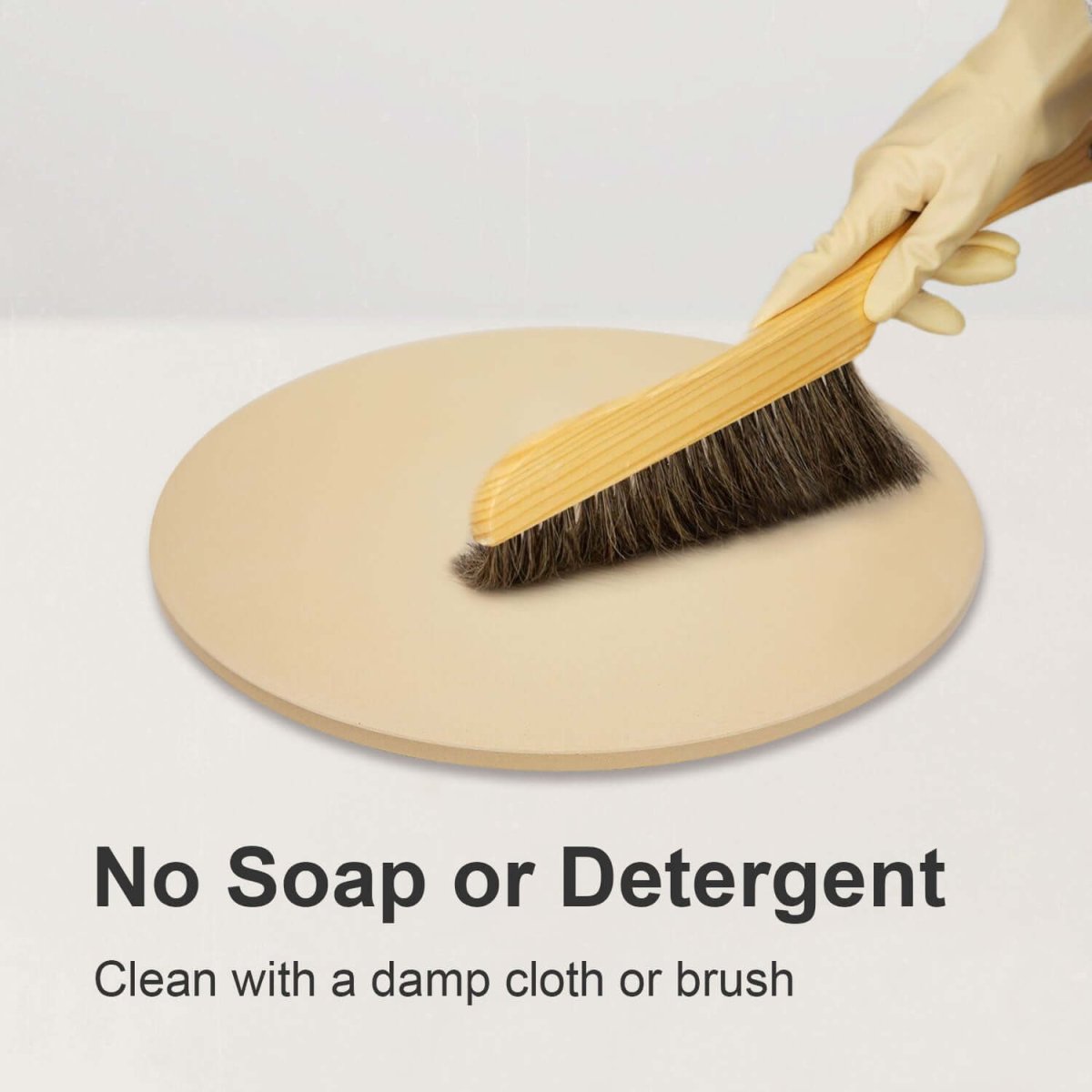 Hand using a brush to clean a round wooden surface with text indicating cleaning instructions.