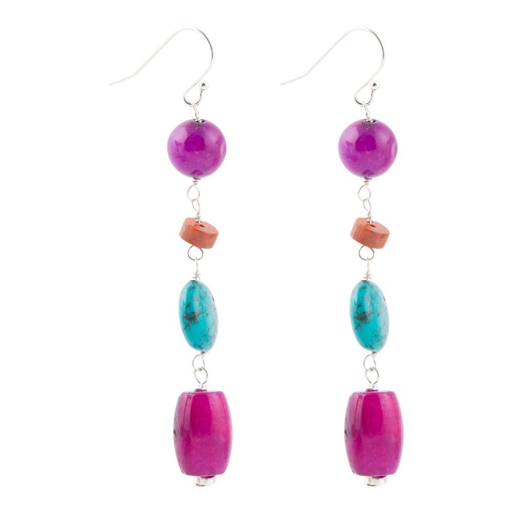 Colorful beaded earrings on a white background