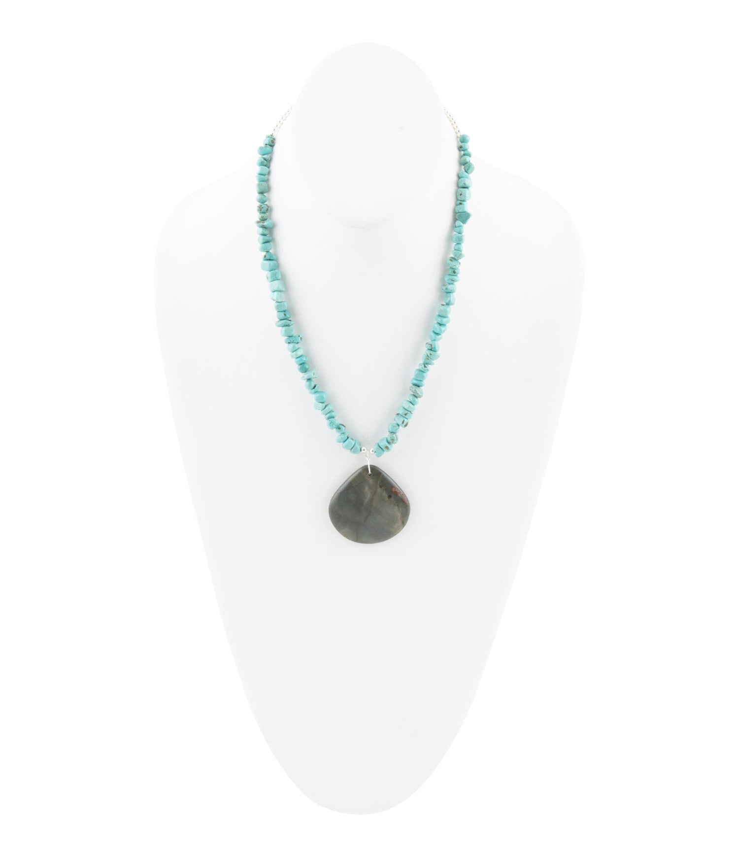 Necklace with turquoise beads and a pendant on a white background