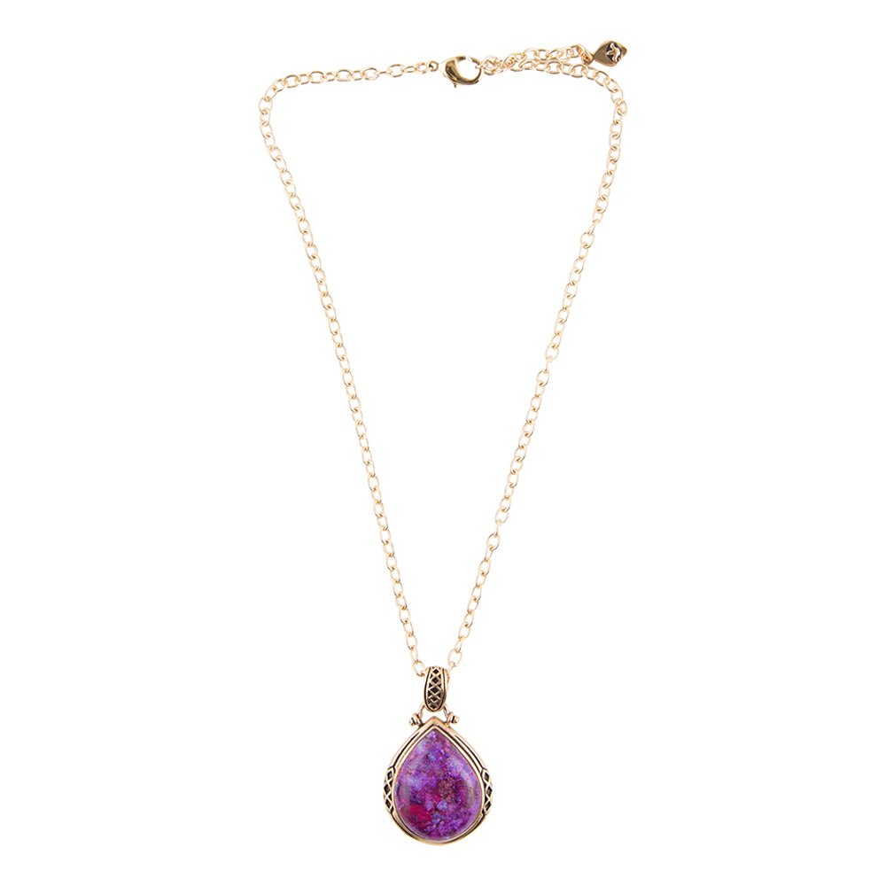 Necklace with a purple teardrop pendant on a white background