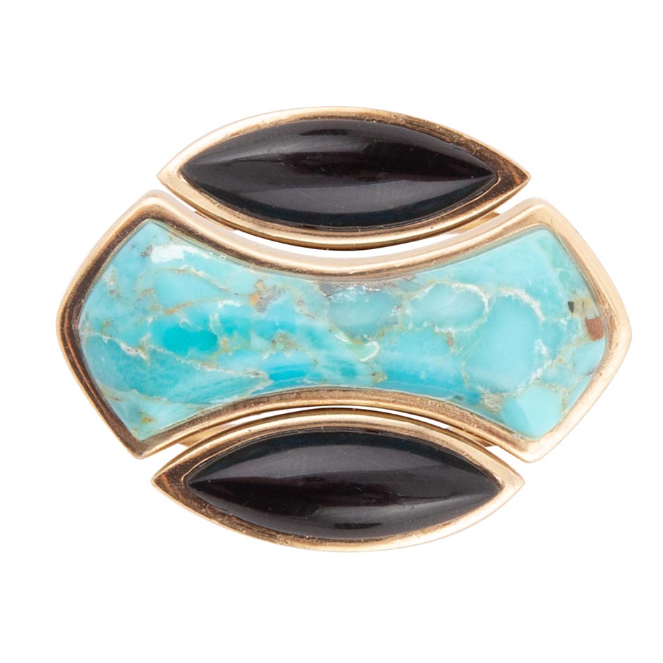 Jewelry with turquoise stone and black stones on a white background