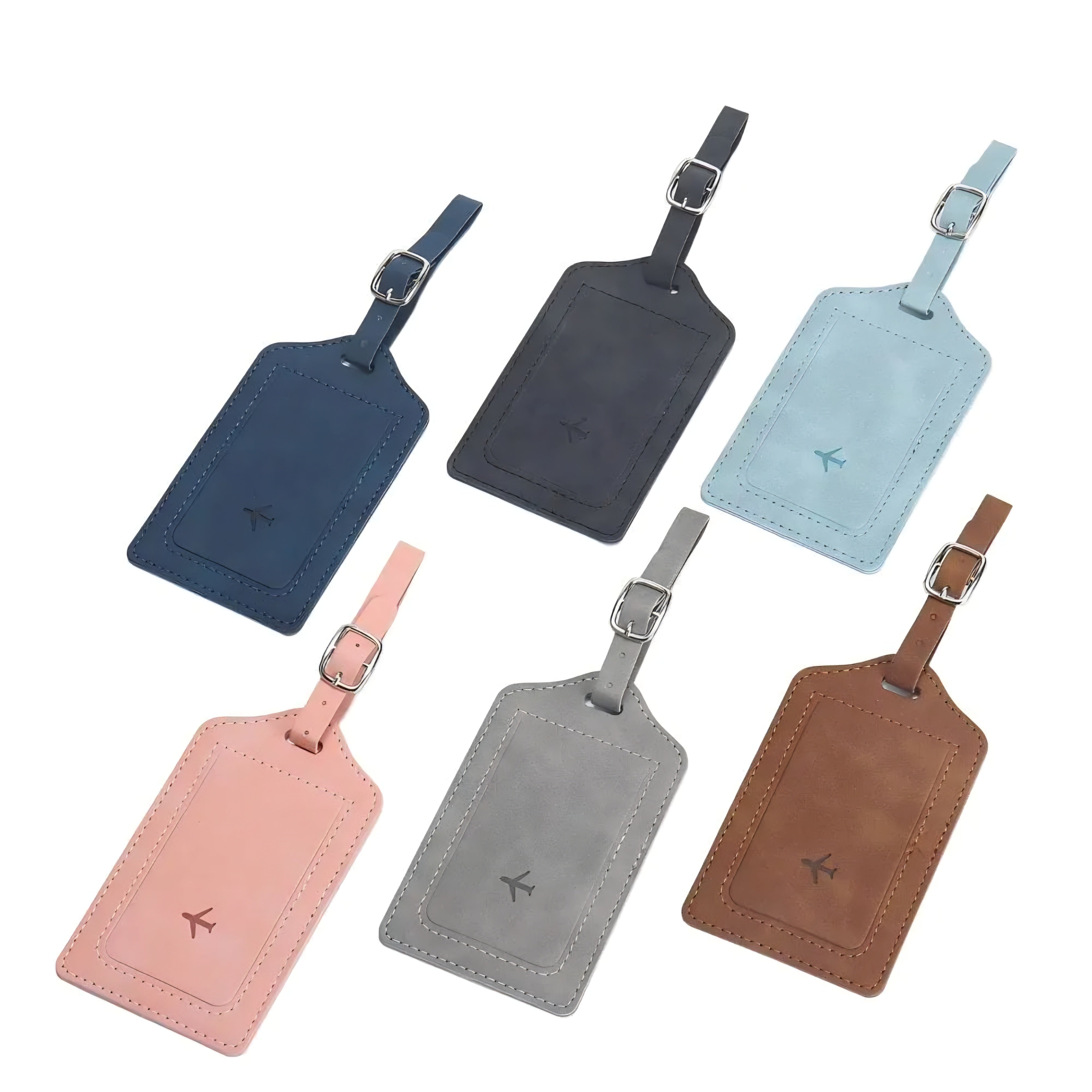 Set of six leather luggage tags in various colors on a white background