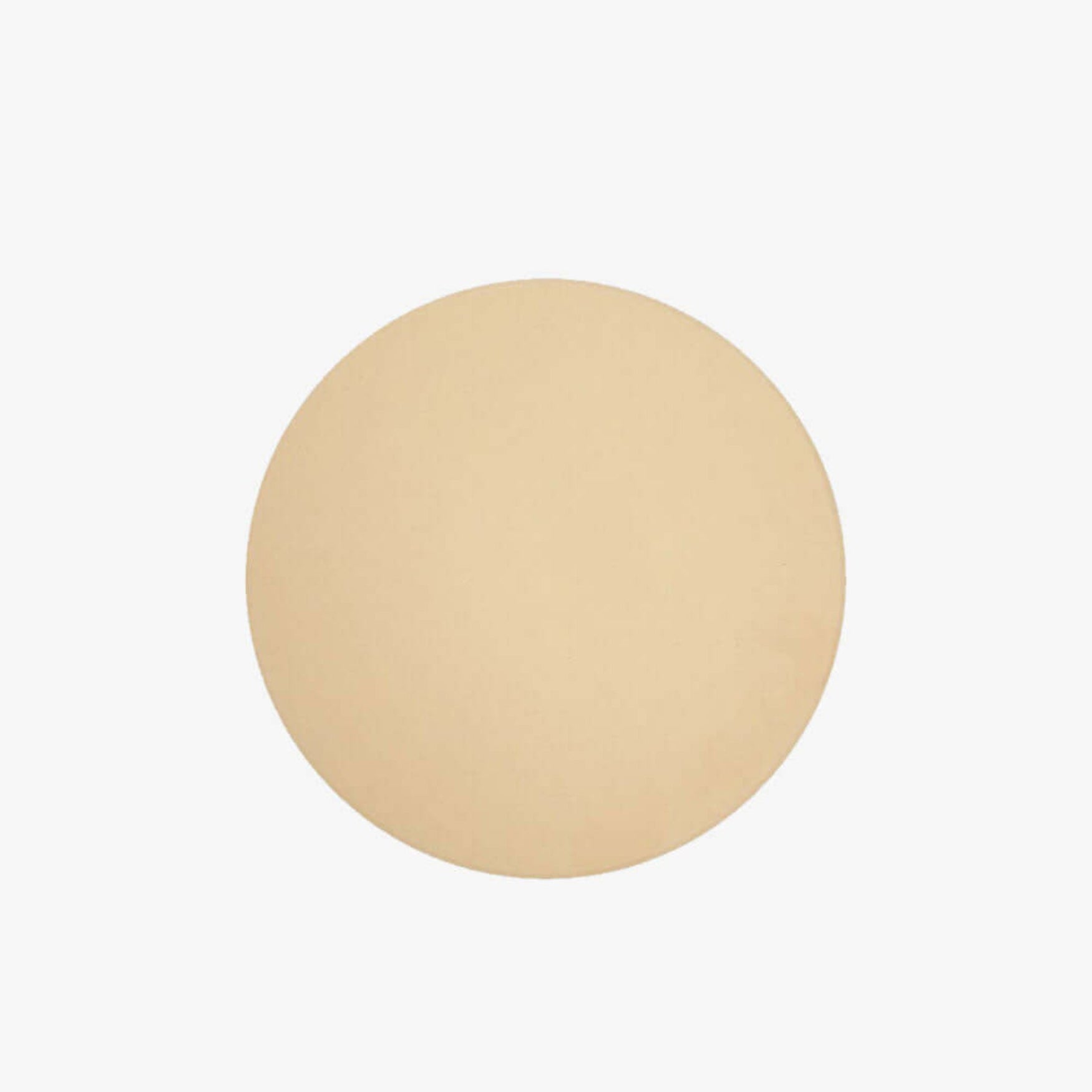 Beige circular object on a white background