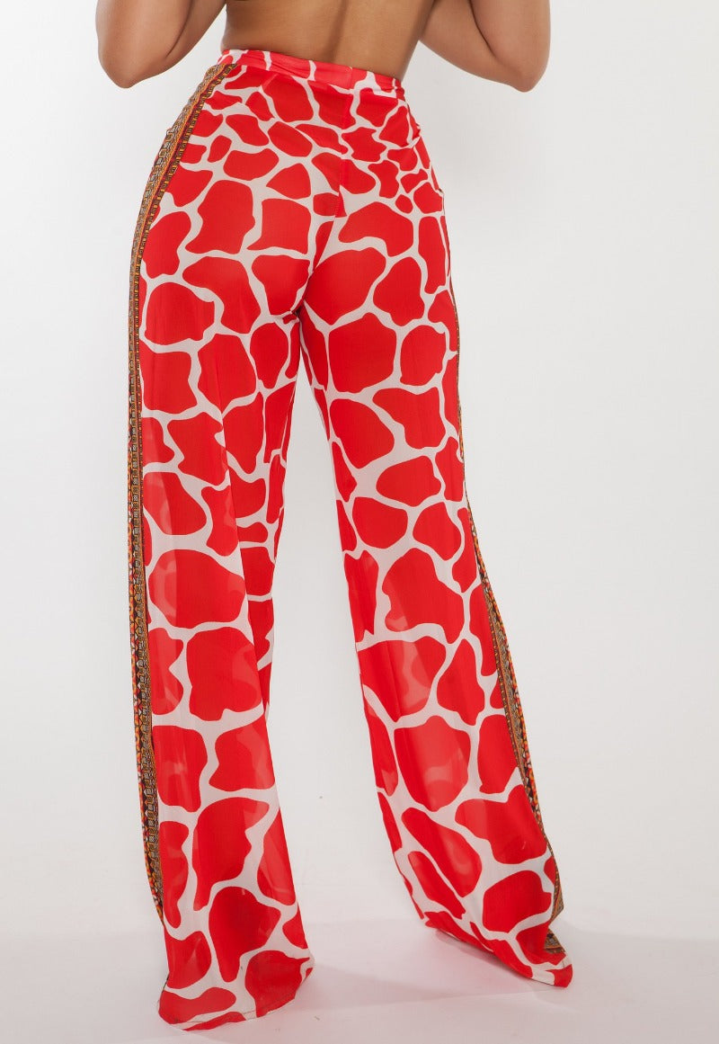 Red and white patterned pants on a white background