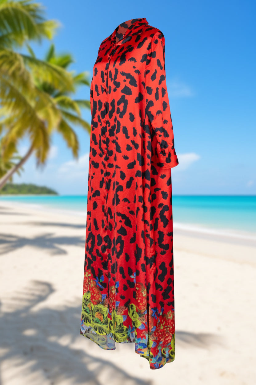 Red dress with black leopard print and colorful bottom hem on a white background
