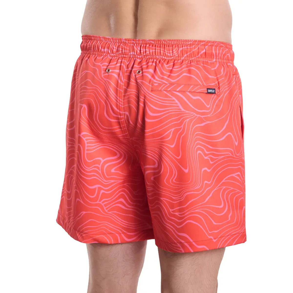 Red swim shorts with a wavy pattern on a white background