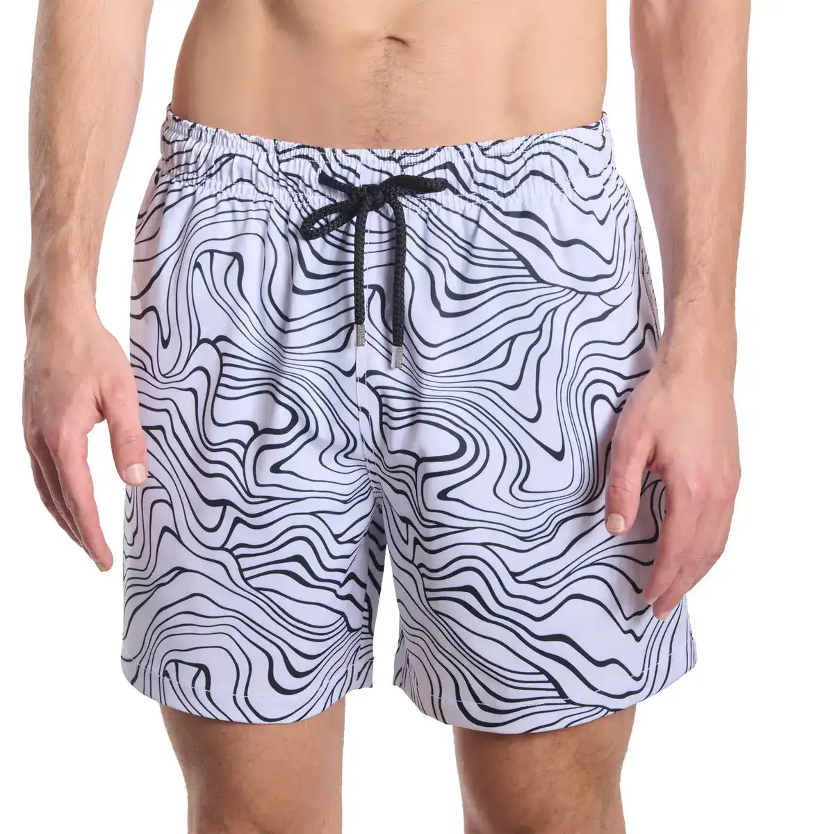 Black and white patterned swim shorts on a white background