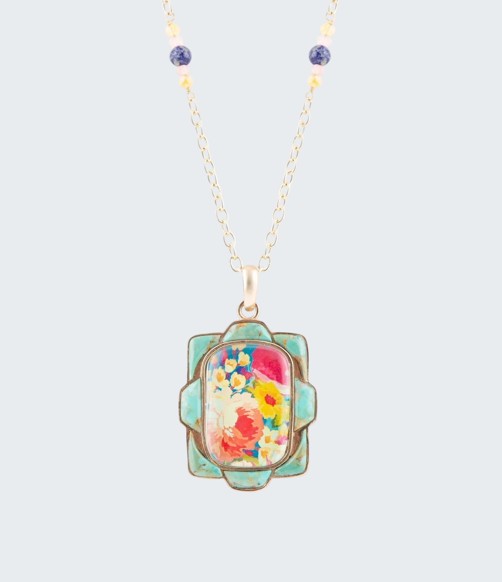 Necklace with a floral pendant on a white background