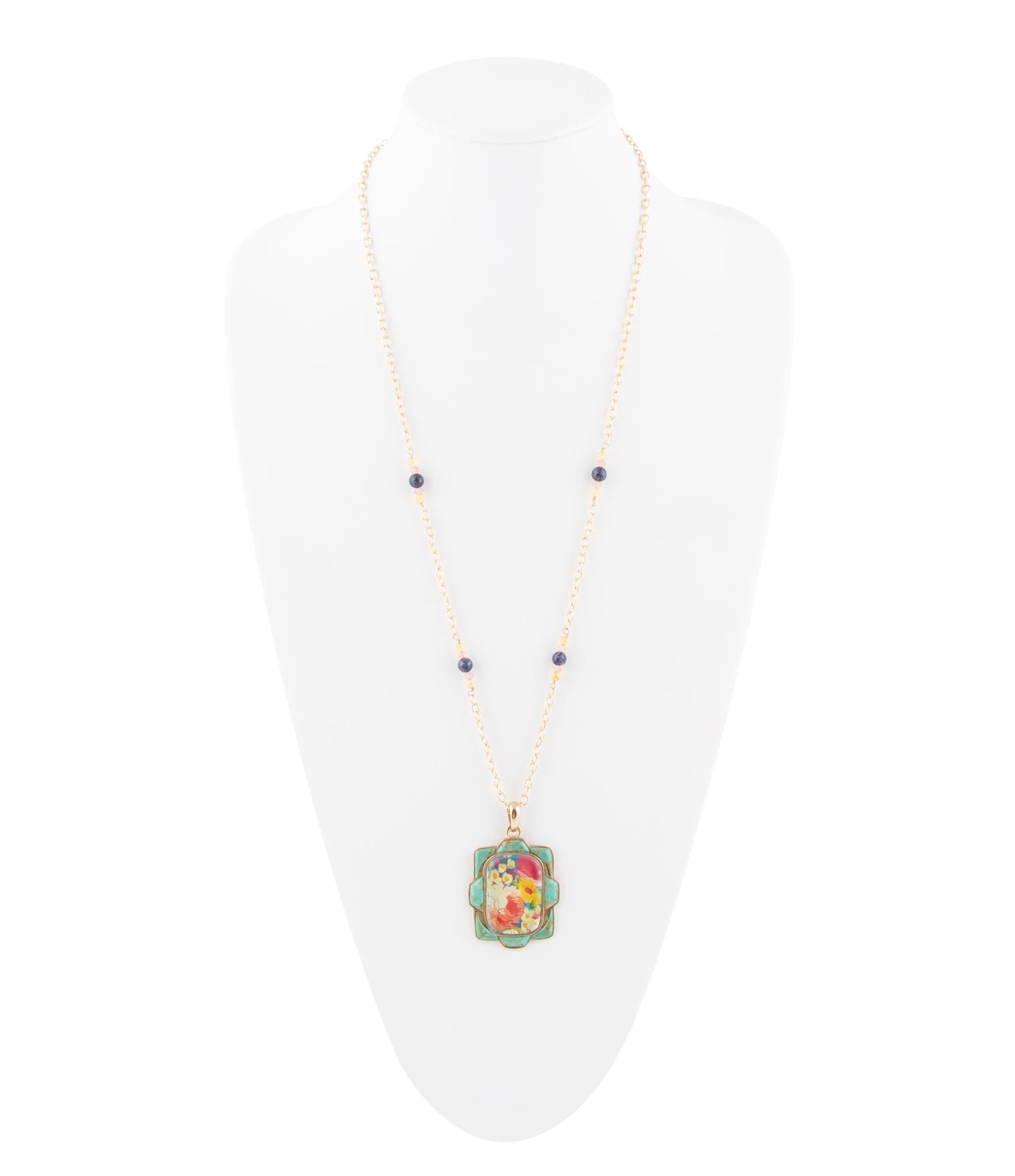 Necklace with a colorful pendant on a white background