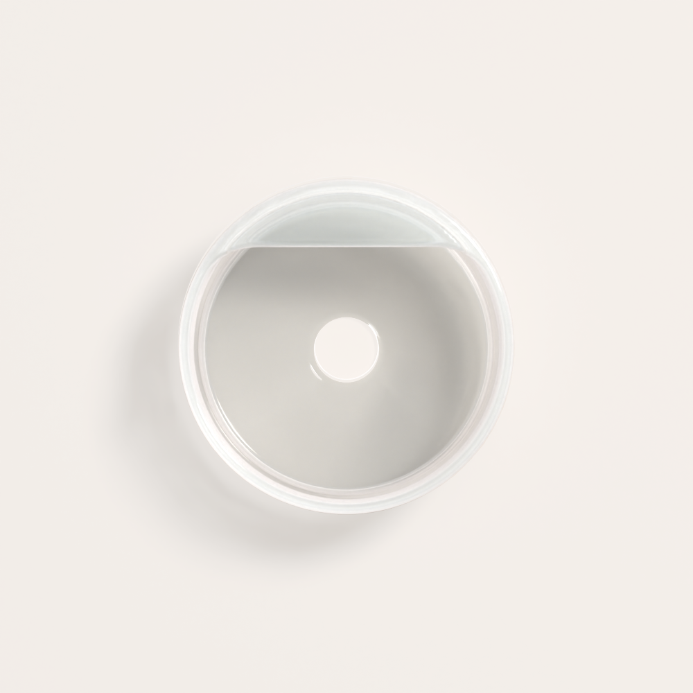 White ceramic sink on a light gray background