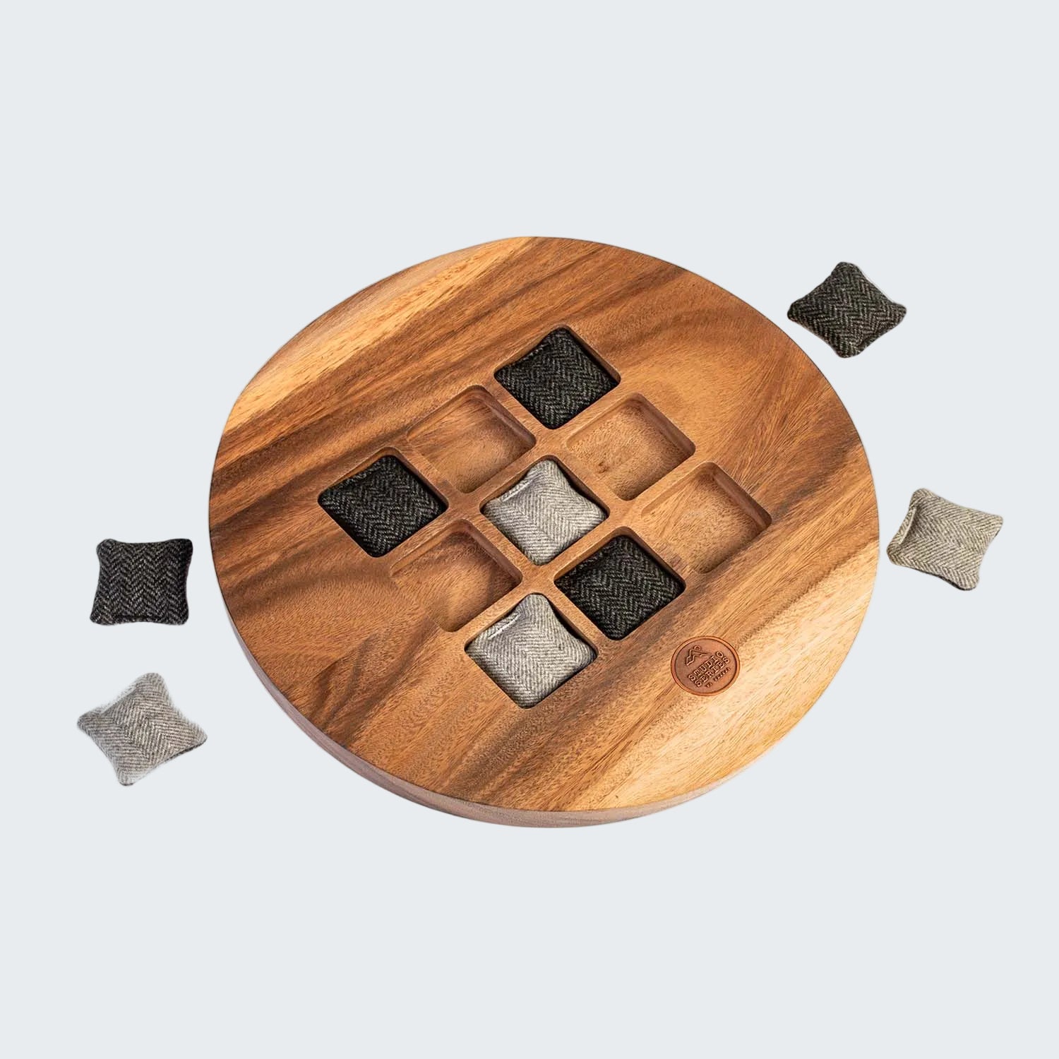 Wooden coaster set with square shapes on a white background