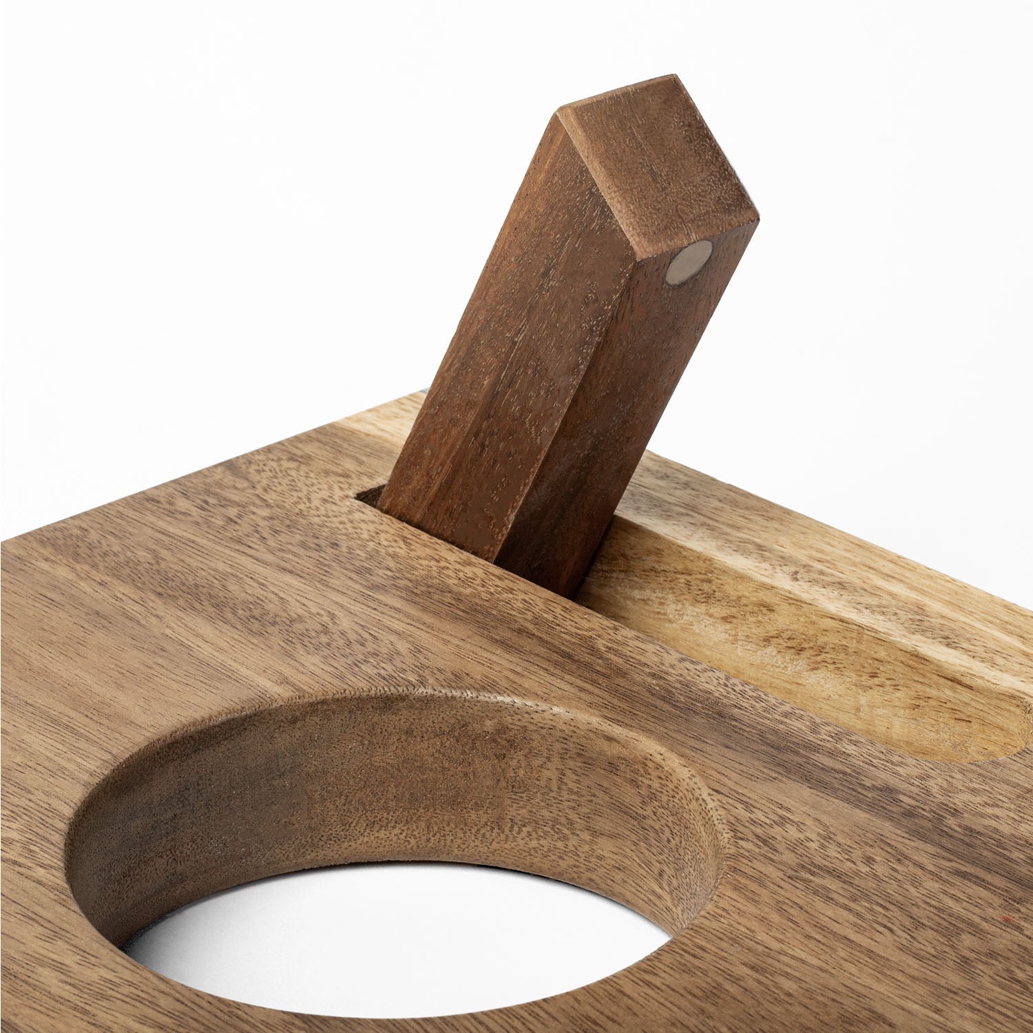 Wooden cutting board with a knife on a white background