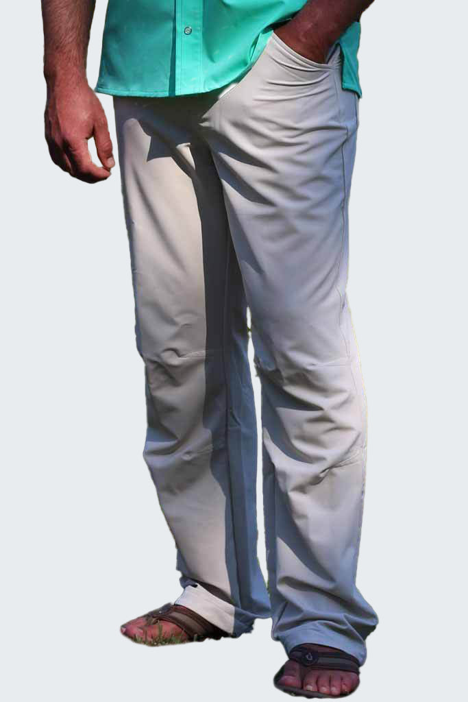 Person wearing light gray pants with a dark stripe on a white background
