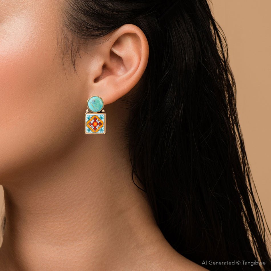 Close-up of an ear wearing a colorful earring against a neutral background