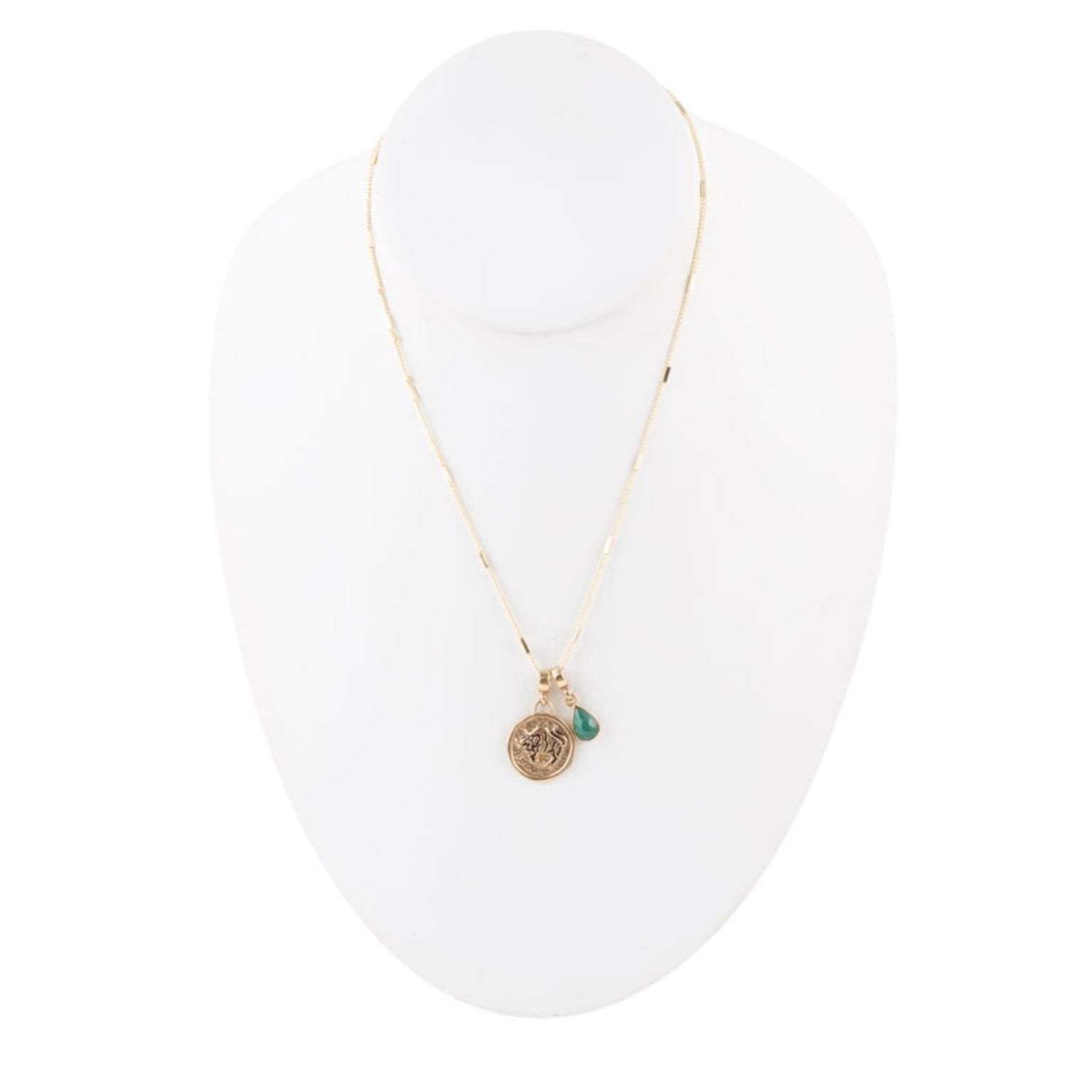Necklace with a pendant on a white stand