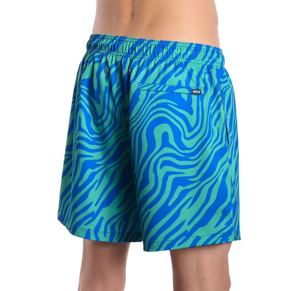Blue and green patterned swim shorts on a white background