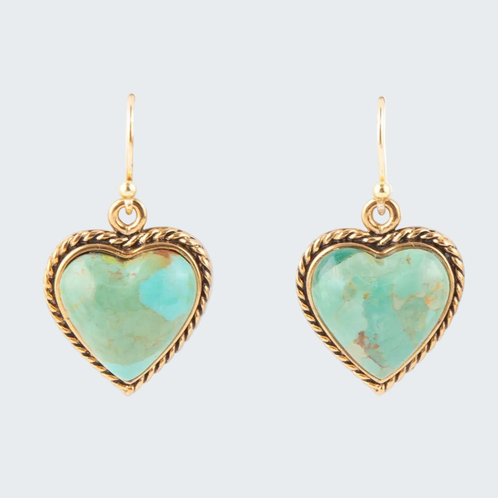Heart-shaped turquoise earrings with gold frames on a white background