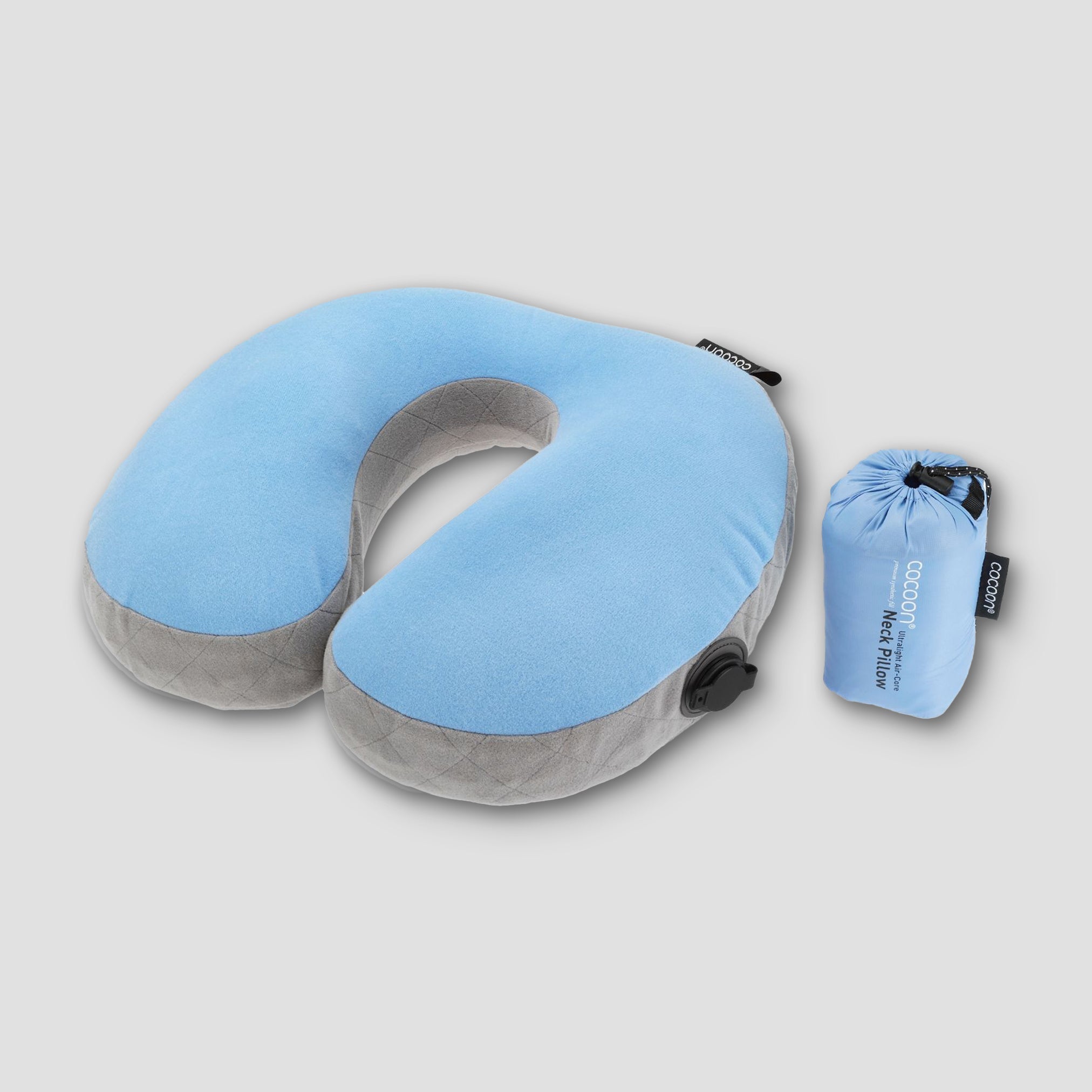 Blue and gray inflatable travel pillow with a carrying pouch on a light gray background