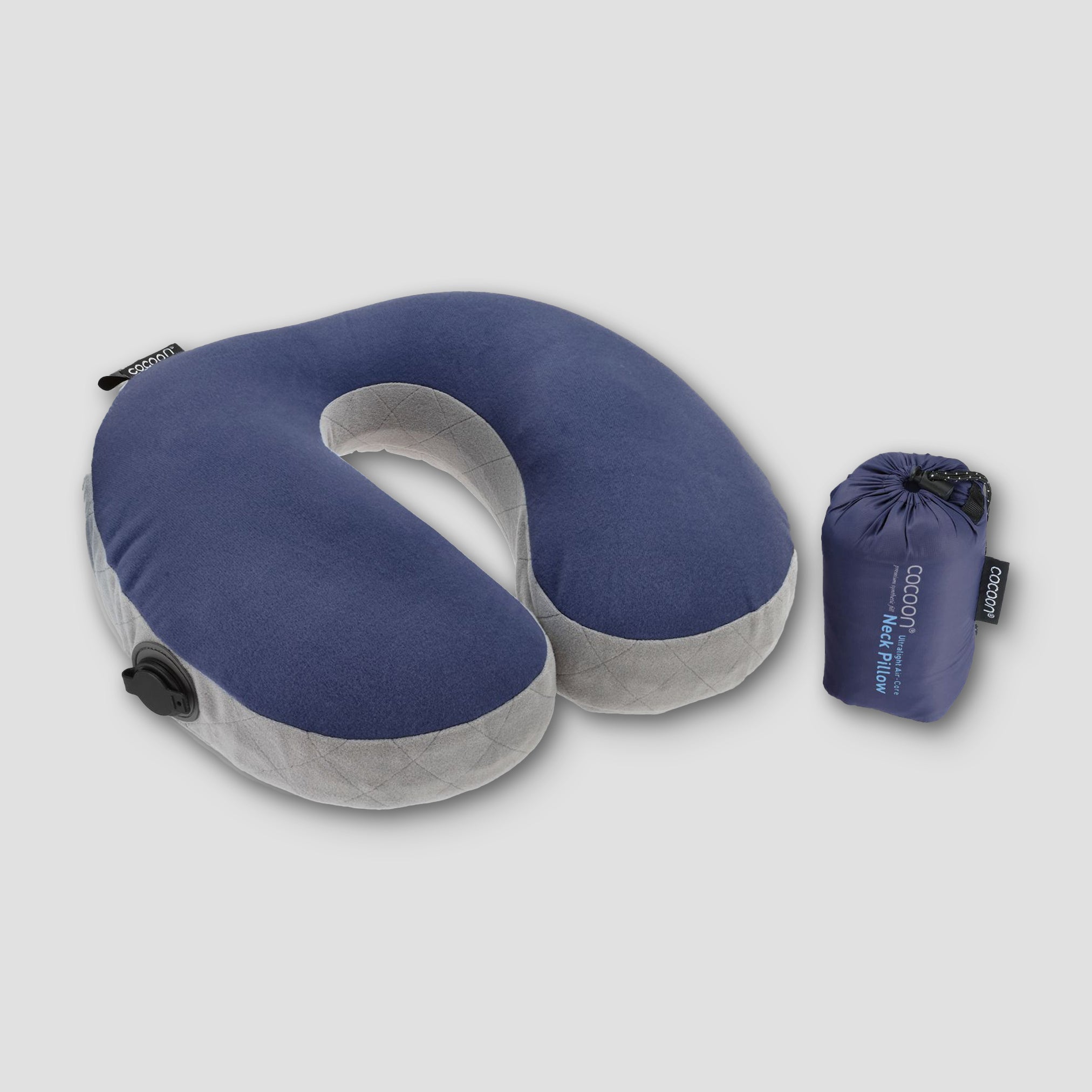 Blue and gray inflatable travel pillow with a carrying pouch on a light gray background