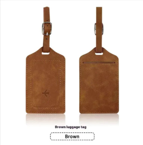 Two brown leather luggage tags on a white background