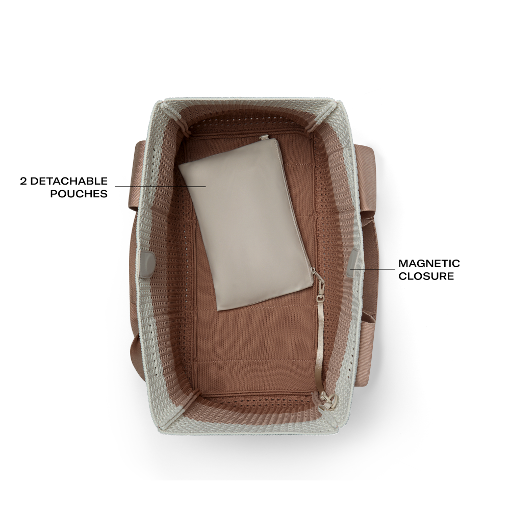 Brown bag with detachable pouches and magnetic closure on a white background