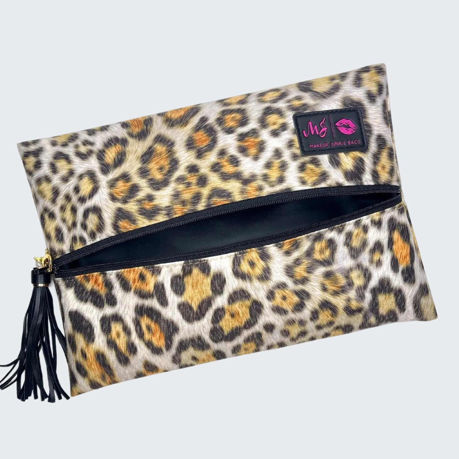 Leopard print pouch with a visible brand logo on a white background