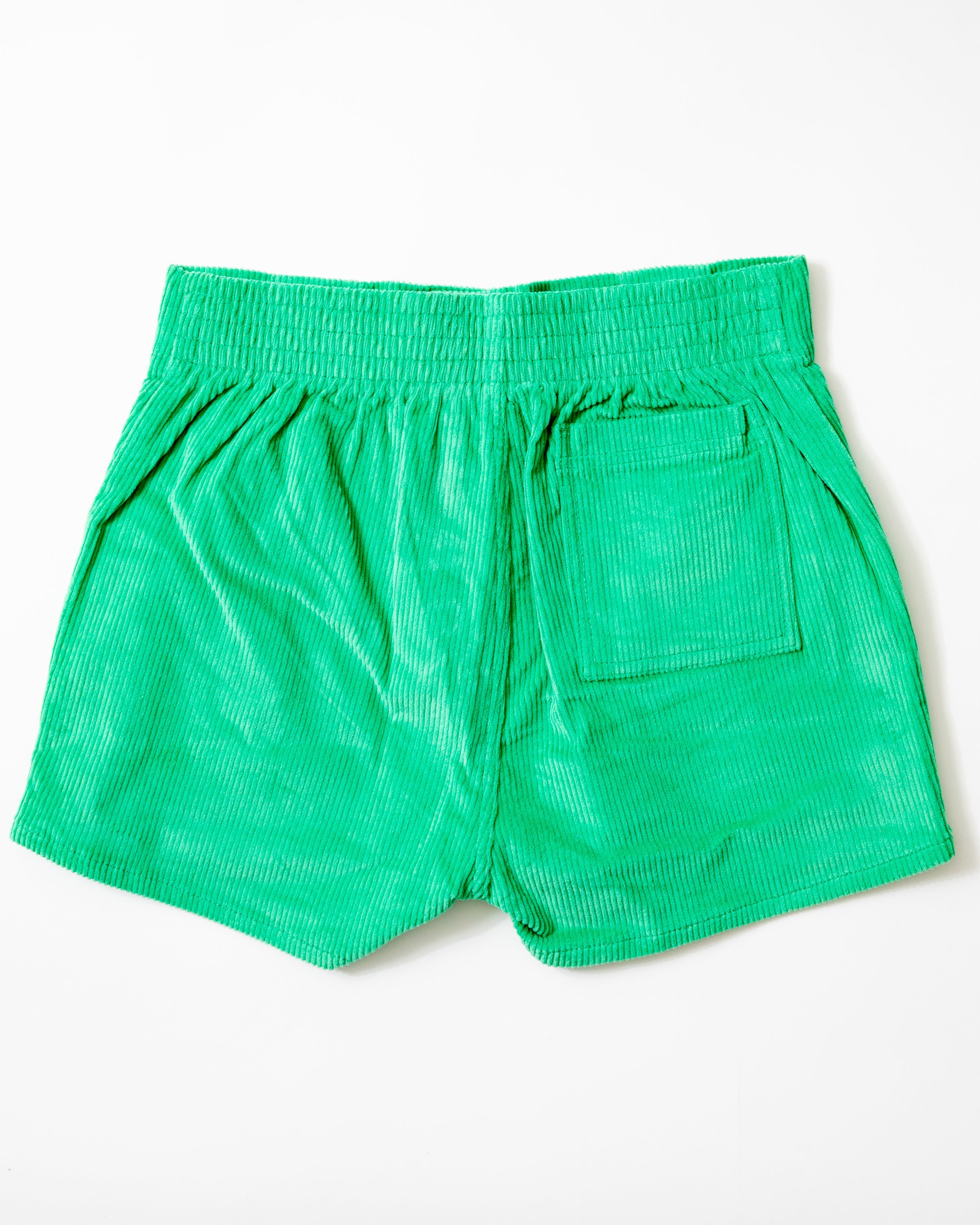 Green shorts on a white background