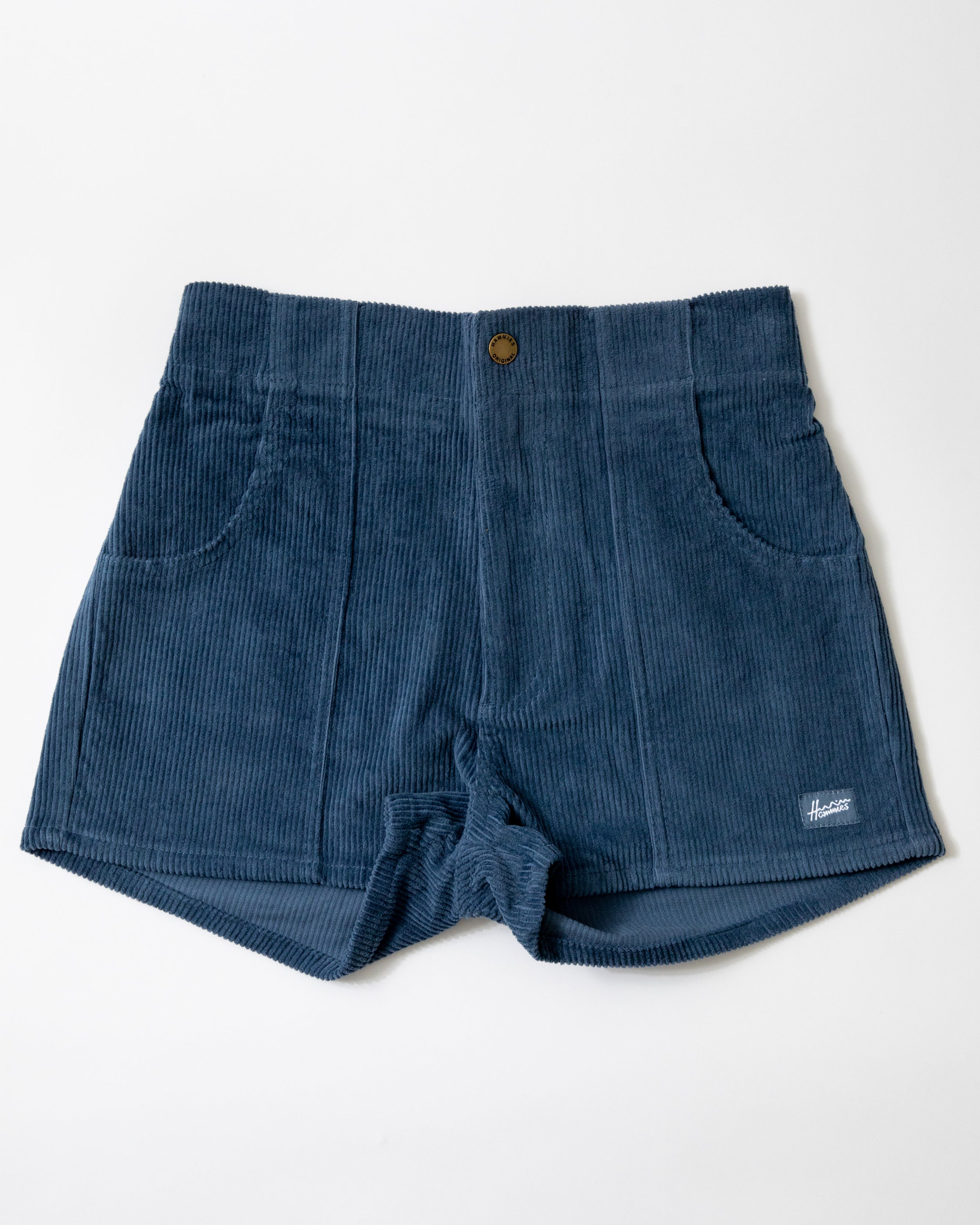 Blue corduroy shorts on a white background