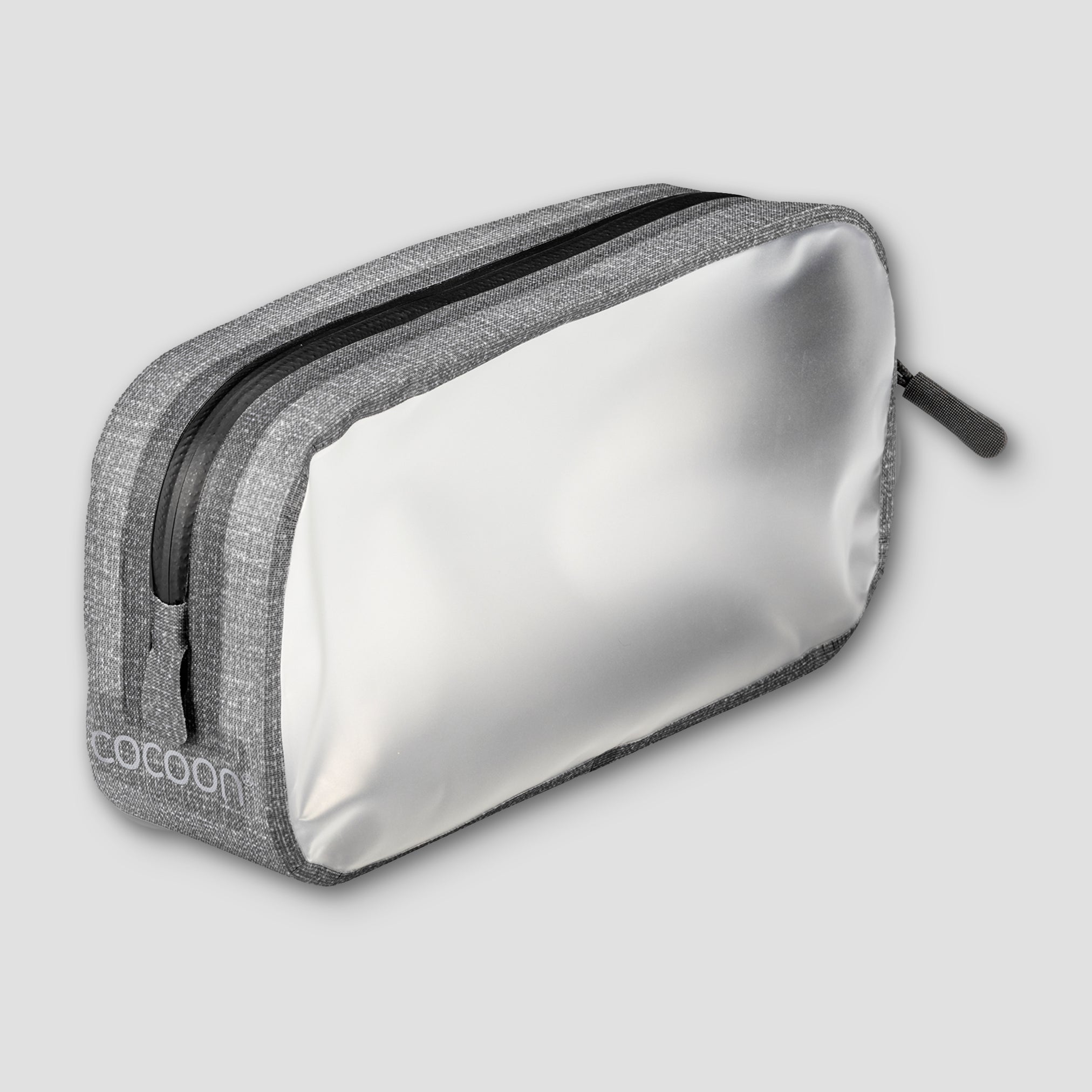 Gray toiletry bag with a silver interior on a light gray background