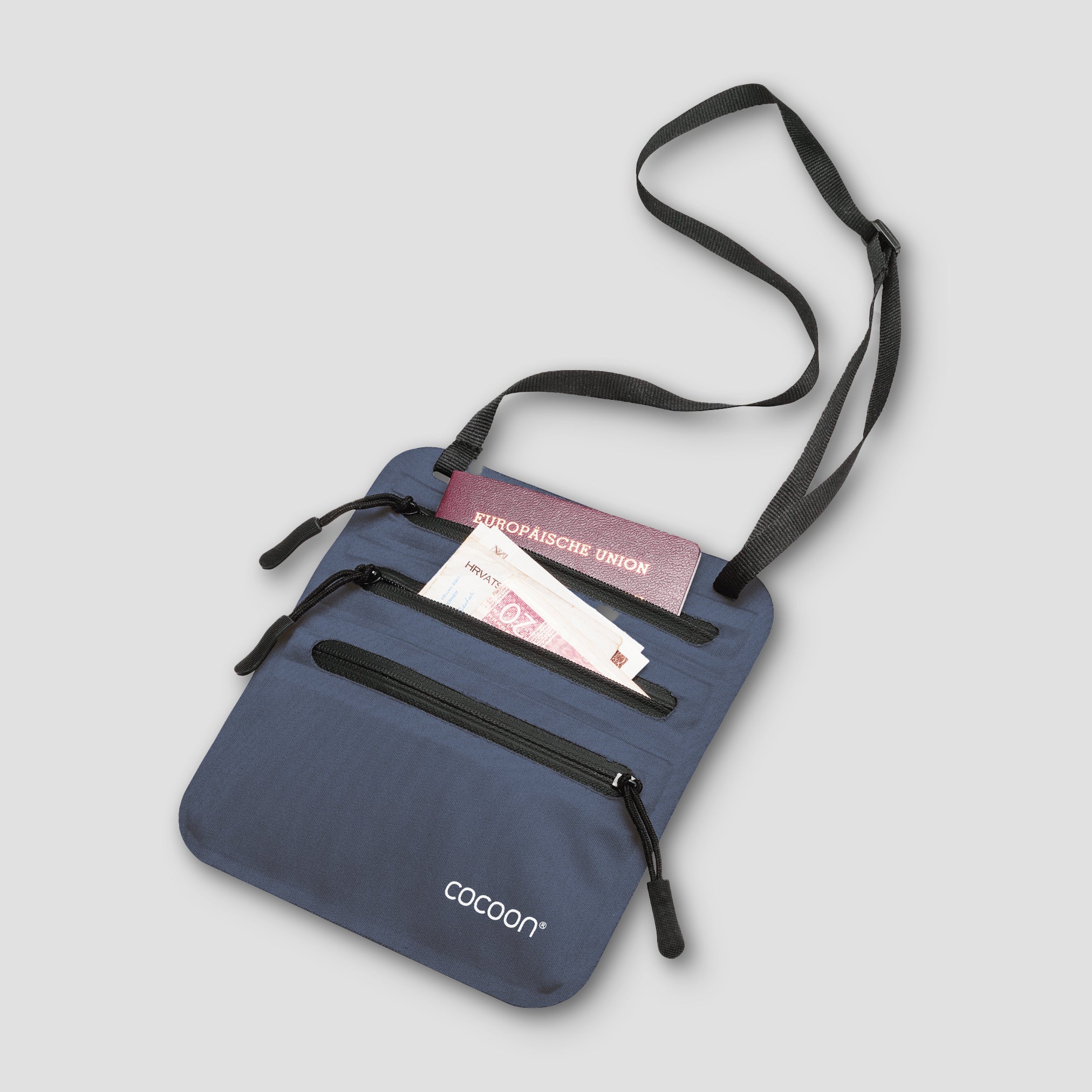 Blue crossbody bag with visible brand name on a light gray background