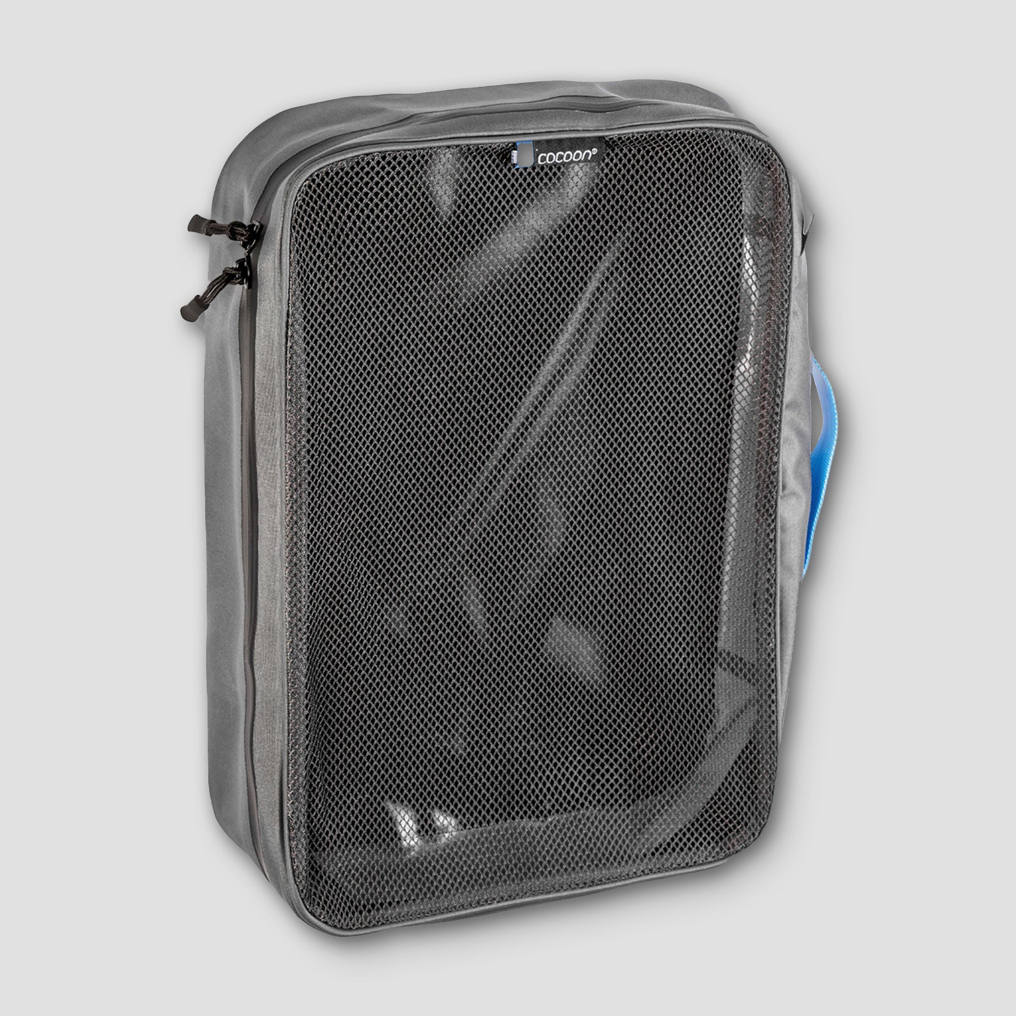 Gray packing cube with mesh side on a light gray background
