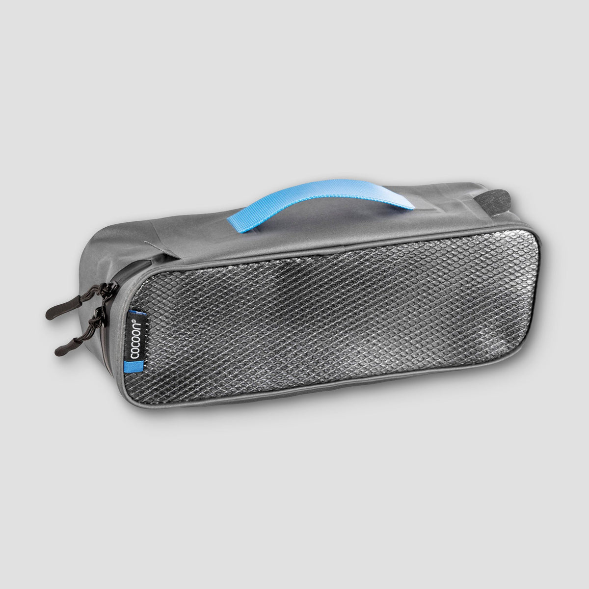 Gray toiletry bag with a blue handle on a light gray background